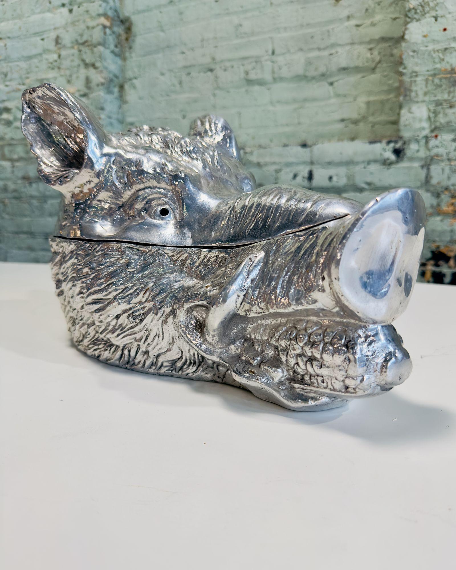 Arthur Court Aluminum Wild Boar Tureen, 1990. The boar can hold an ear of corn in its mouth and steam comes out of its eyes when hot food is placed inside. Very rare piece in excellent condition.