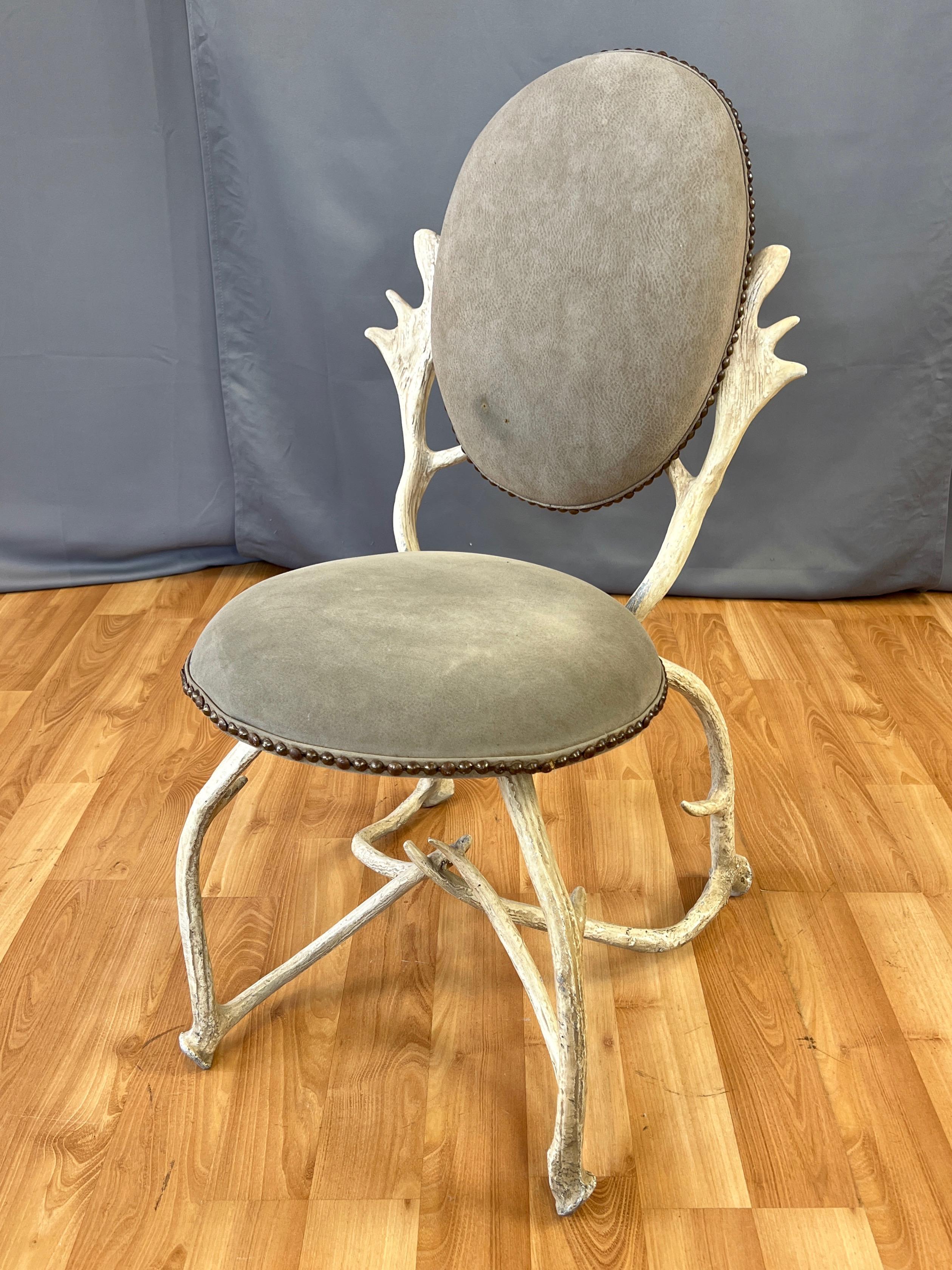 An uncommon 1970s faux-antler side chair with faux-leather suede upholstery by Arthur Court for Arthur Court Designs.

Part of San Francisco-based designer Court’s (b. 1928–2015) signature line of sand-cast aluminum antler motif furniture, which