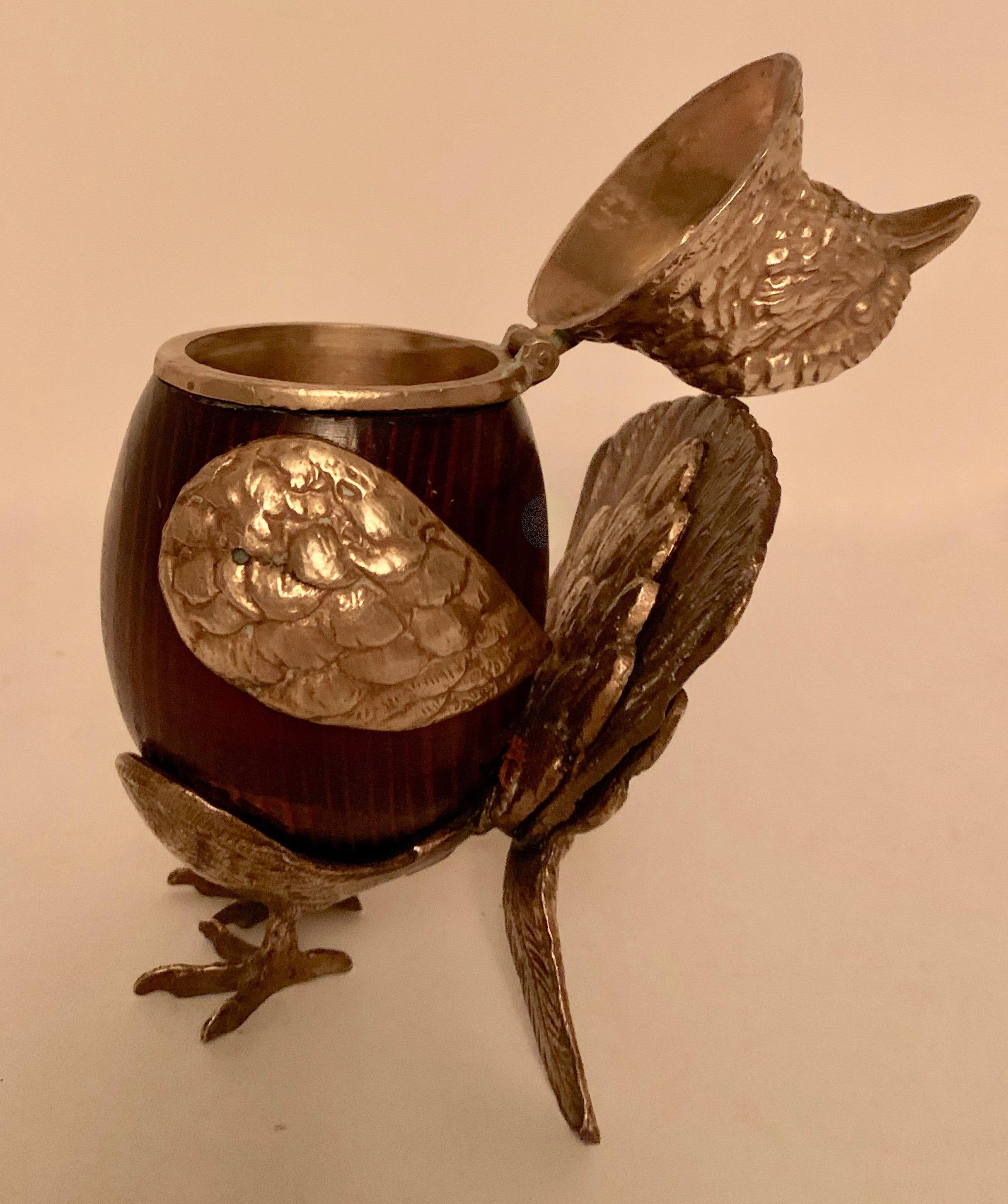 Arthur Court brass and wood bird stash box - the head tilts back to reveal a box to store private items and/or 420. A lovely box and great addition to any table or shelf, or use as a nice desk accessory.

A wonderful gift for the ornithologist in