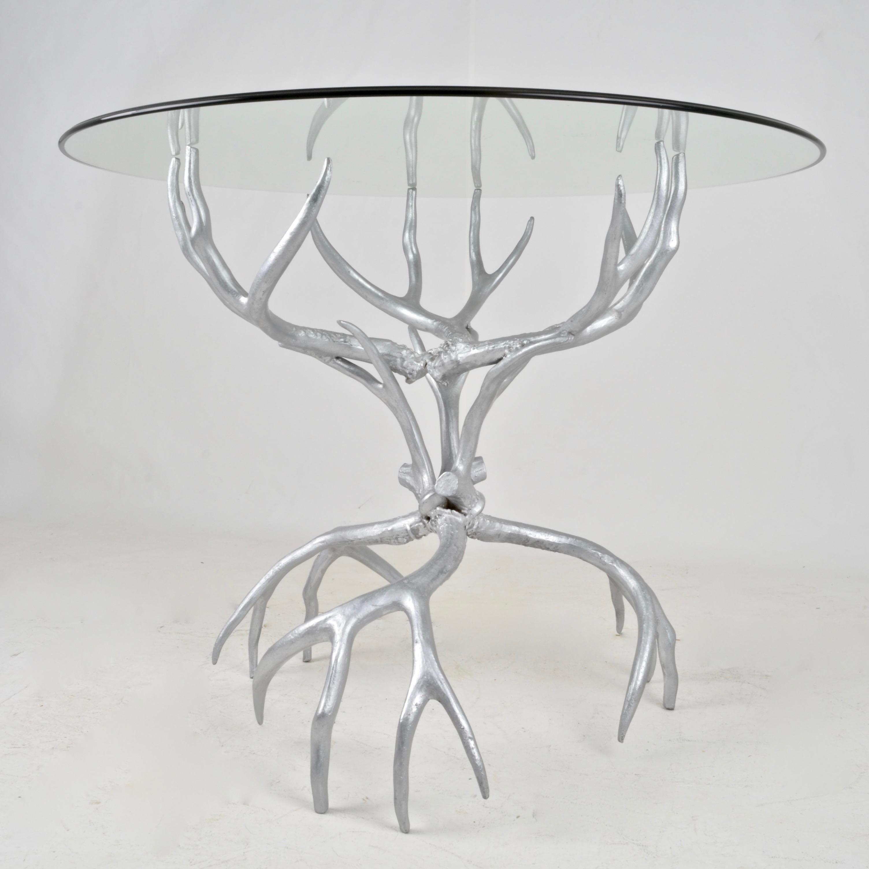 Beautifully cast, Arthur Court's antler inspired furniture combines terrific charm and practicality. The design replicates actual antlers combined to form a sturdy and durable table base. New glass topper is 1/2