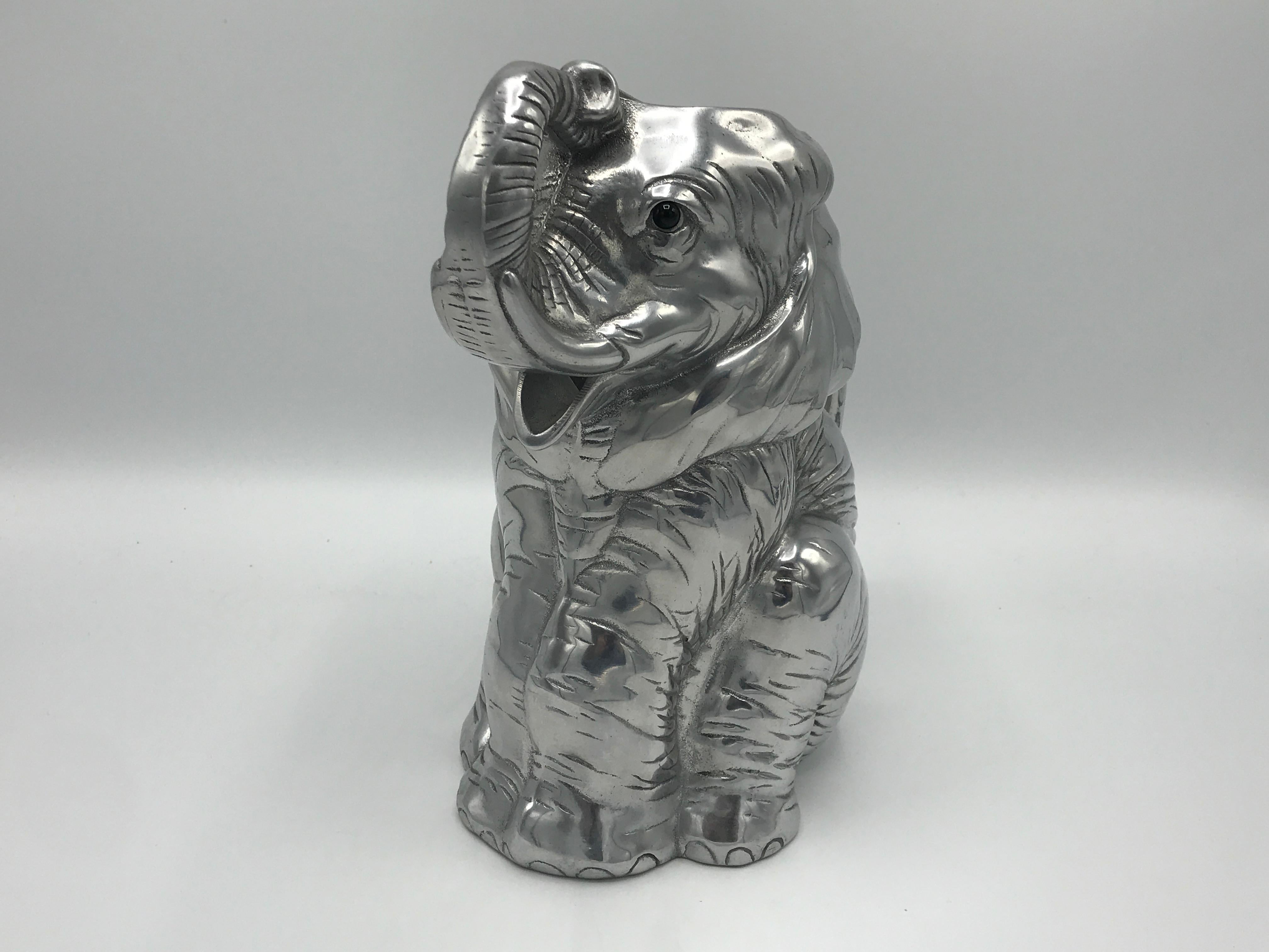 Offered is an unusual and unique, cast-aluminum sculptural elephant pitcher, by Arthur Court, circa 2003. Heavy, 3.5 lbs.