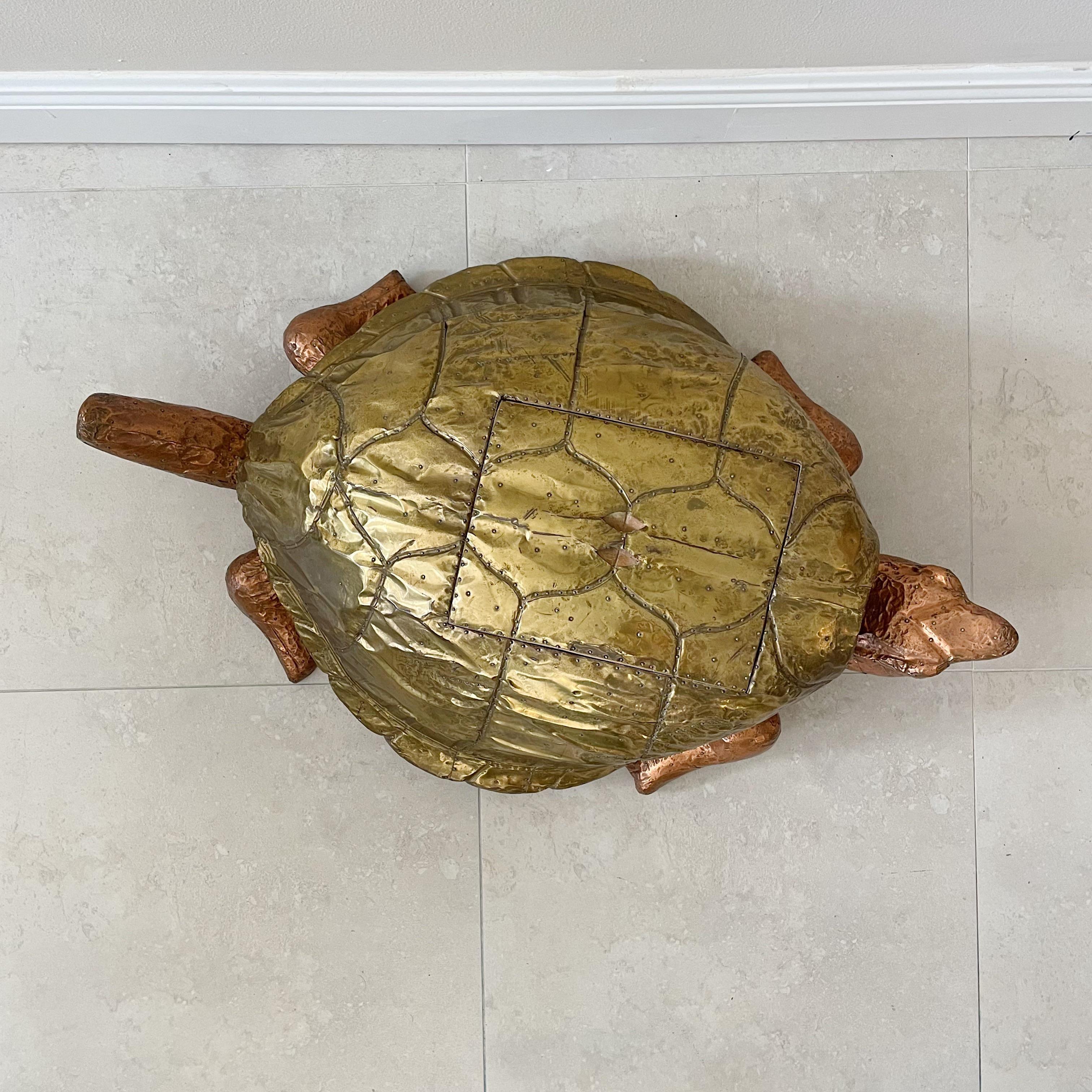 Super rare Turtle box in brass and copper by Arthur Court, 1980's. Wood turtle clad in copper with the shell clad in brass, with lid on its back. Measures 33