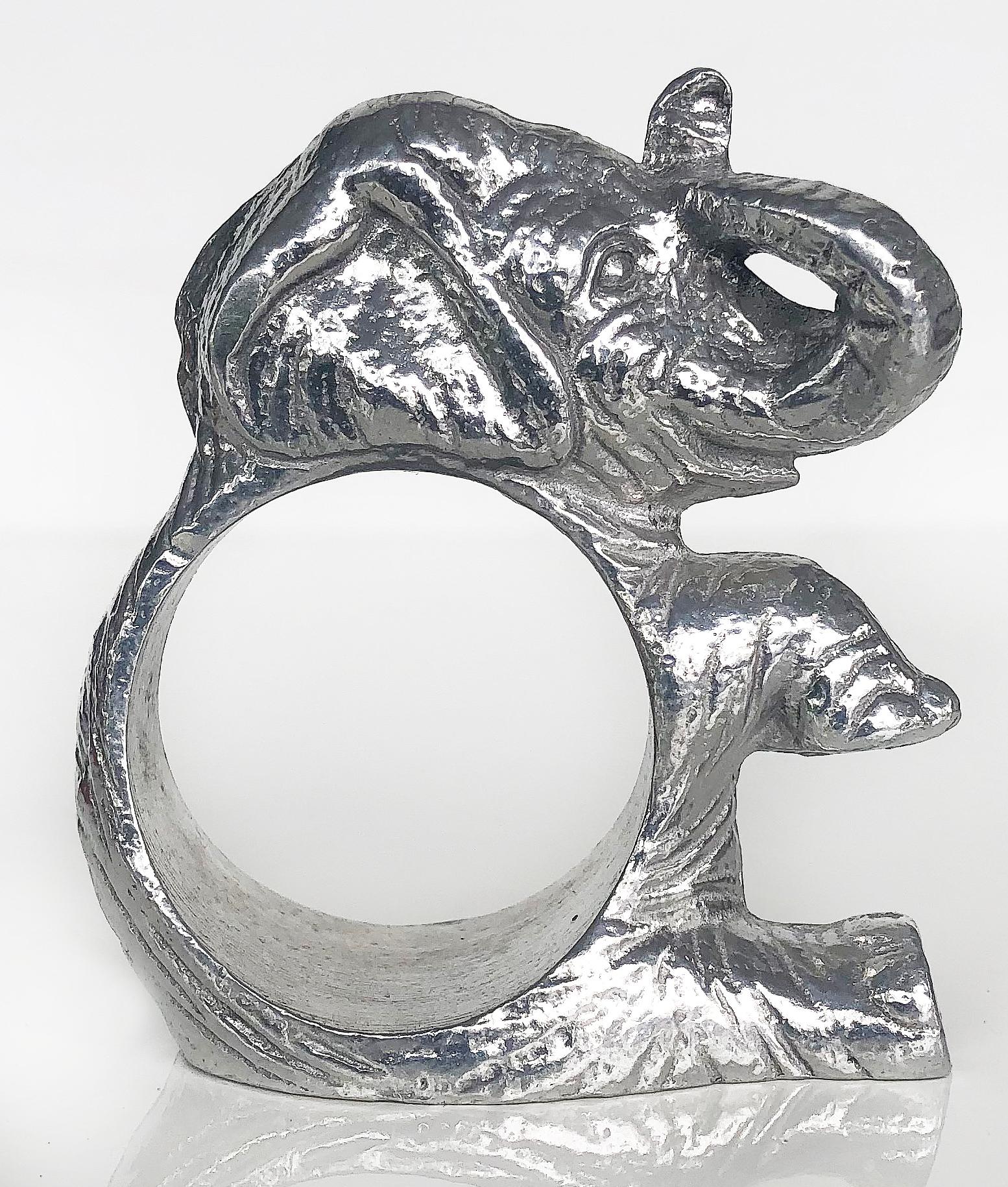 Arthur Court designs aluminum elephant napkin rings, new in boxes, set of (8)

Offered is a set of 8 vintage Arthur Cout Elephant napkin rings which are unsued and still new in their original boxes.