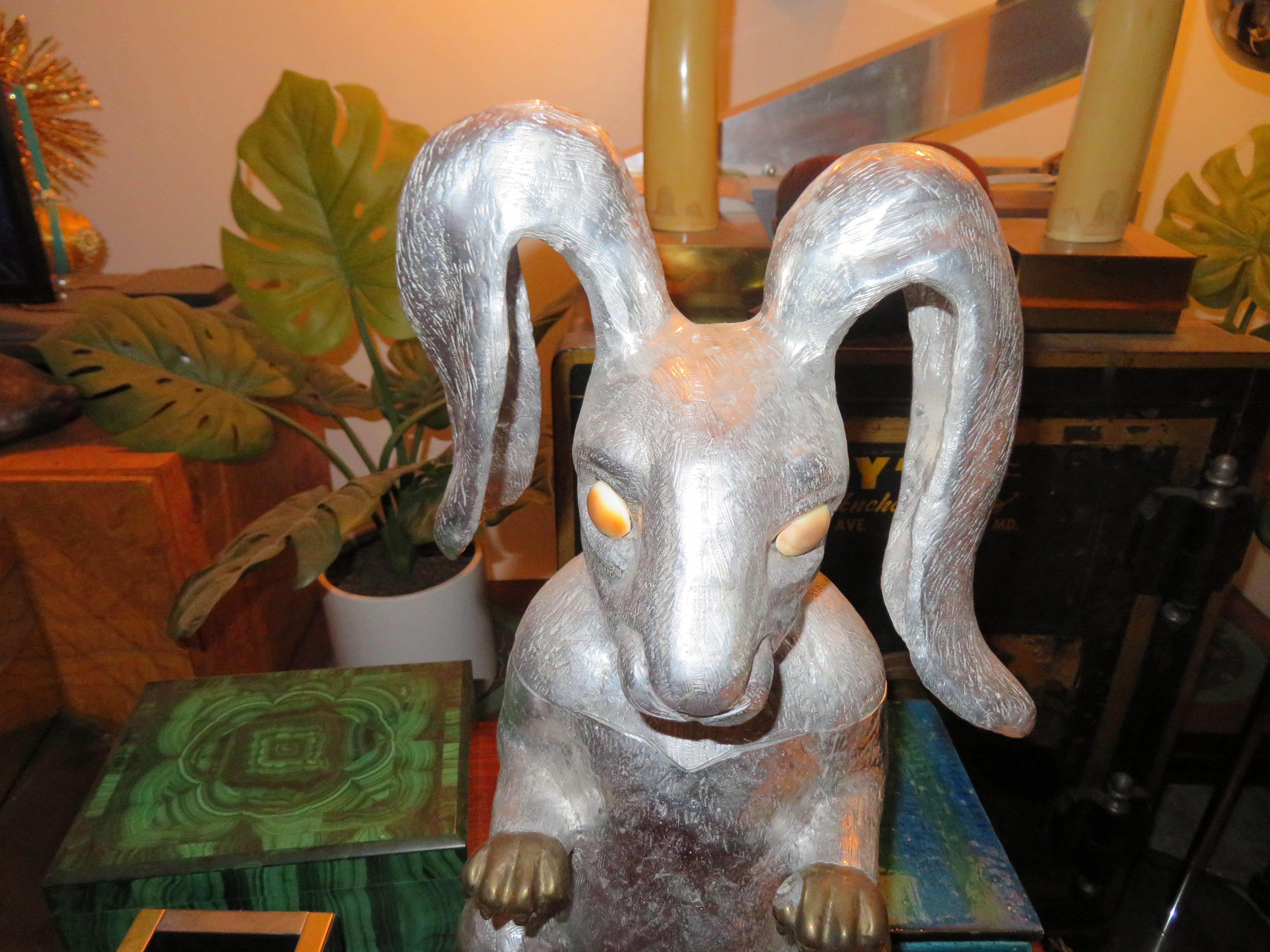 Whimsical Arthur Court rabbit hinged ice bucket or wine cooler, realistically cast and modeled figure of a standing rabbit, with gemstone eyes, hinged lid, and brass paws. Stamped Copyright Arthur Court 1986.