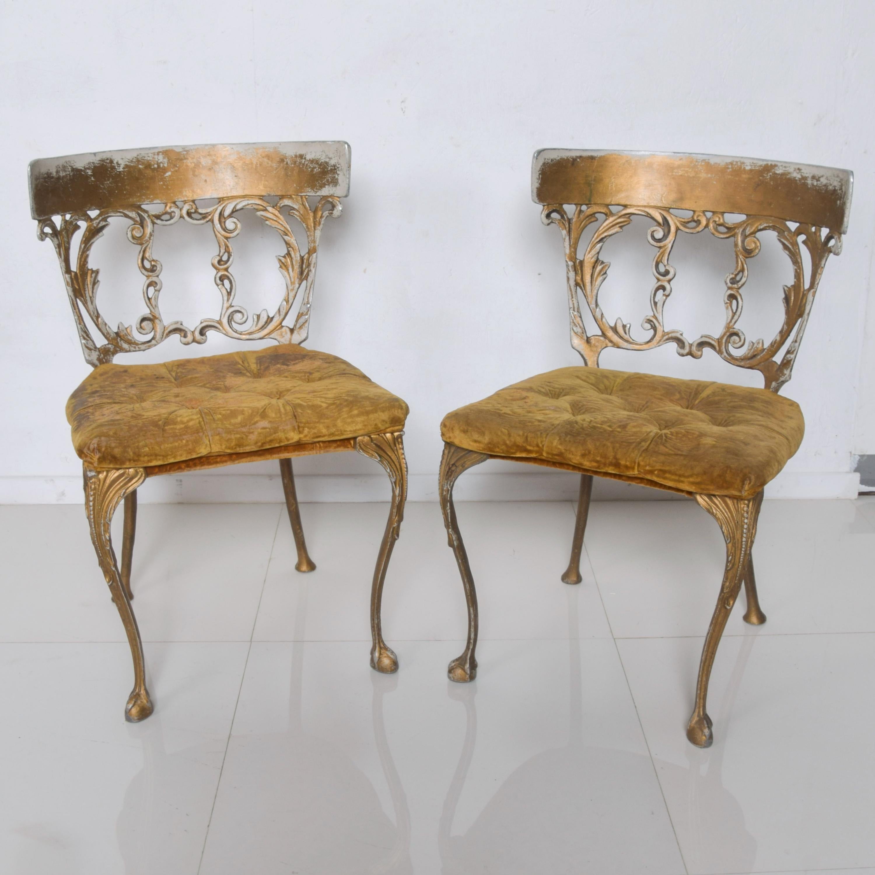 In the style of Arthur Court vintage neoclassical gold velvet chairs 1970s
Sophisticated with fabulous flair. Cabriole legs and lovely gold scroll.
Unmarked
Completely unrestored untouched vintage preowned condition. Selling as is. 
Waiting for