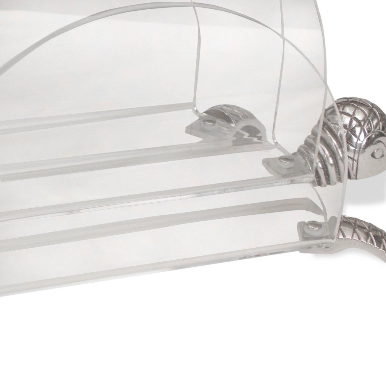 Arthur Court Turtle theme aluminum & lucite magazine rack.

USA, circa 1970

Dimensions: 18” L x 11” D x 11” H