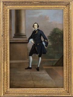 Portrait of Lascelles Raymond Iremonger, full-length by a Classical portico