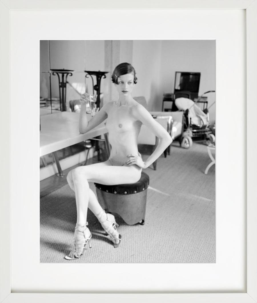 Kristen McMenamy - nude model with champaign, fine art photography, 1995 - Photograph by Arthur Elgort