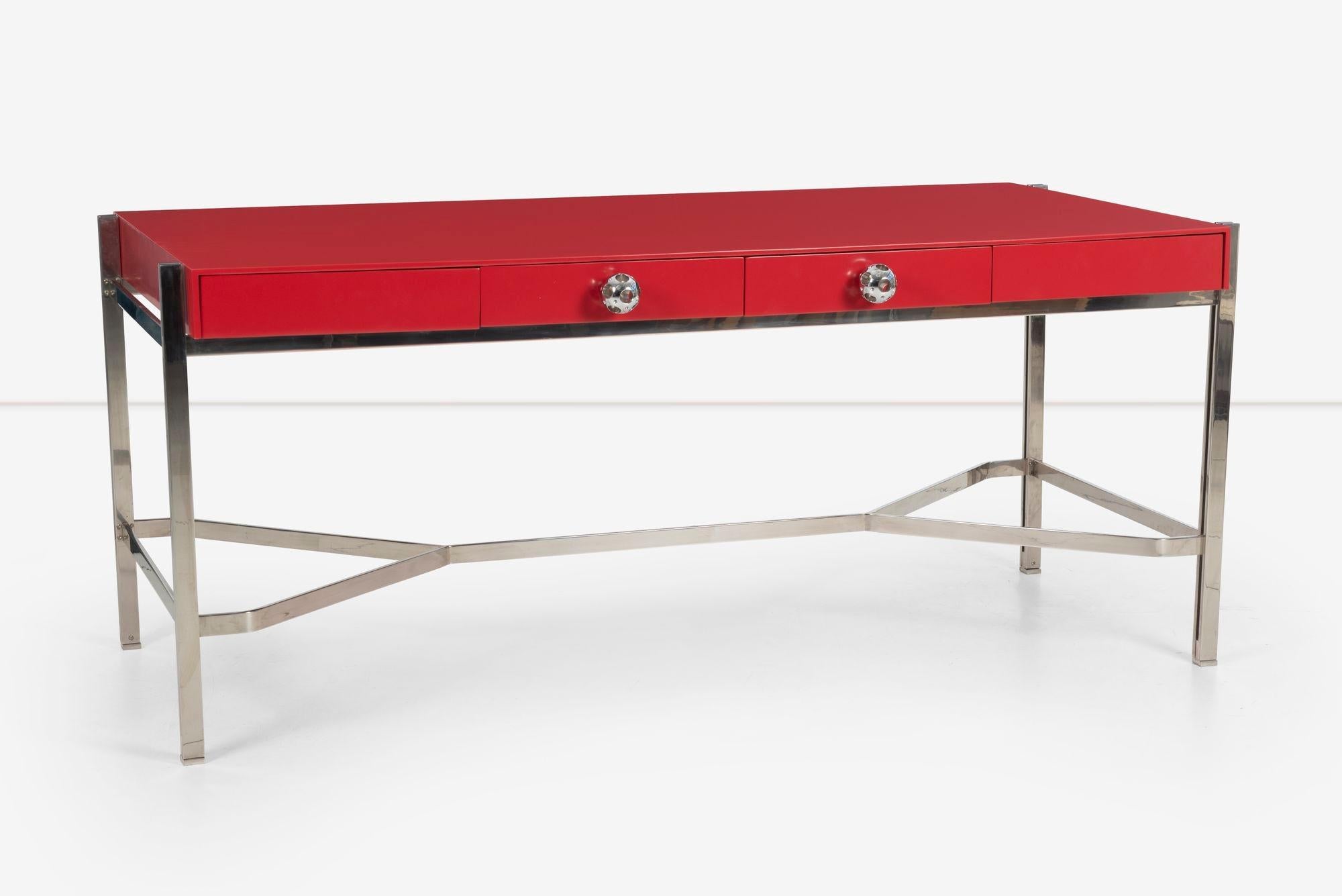 Arthur Elrod Custom desk, Manufactured by Pace; features a red lacquered Desk Top with three pencil drawers with solid perforated chrome plated pulls.
The frame is also chrome-plated steel.