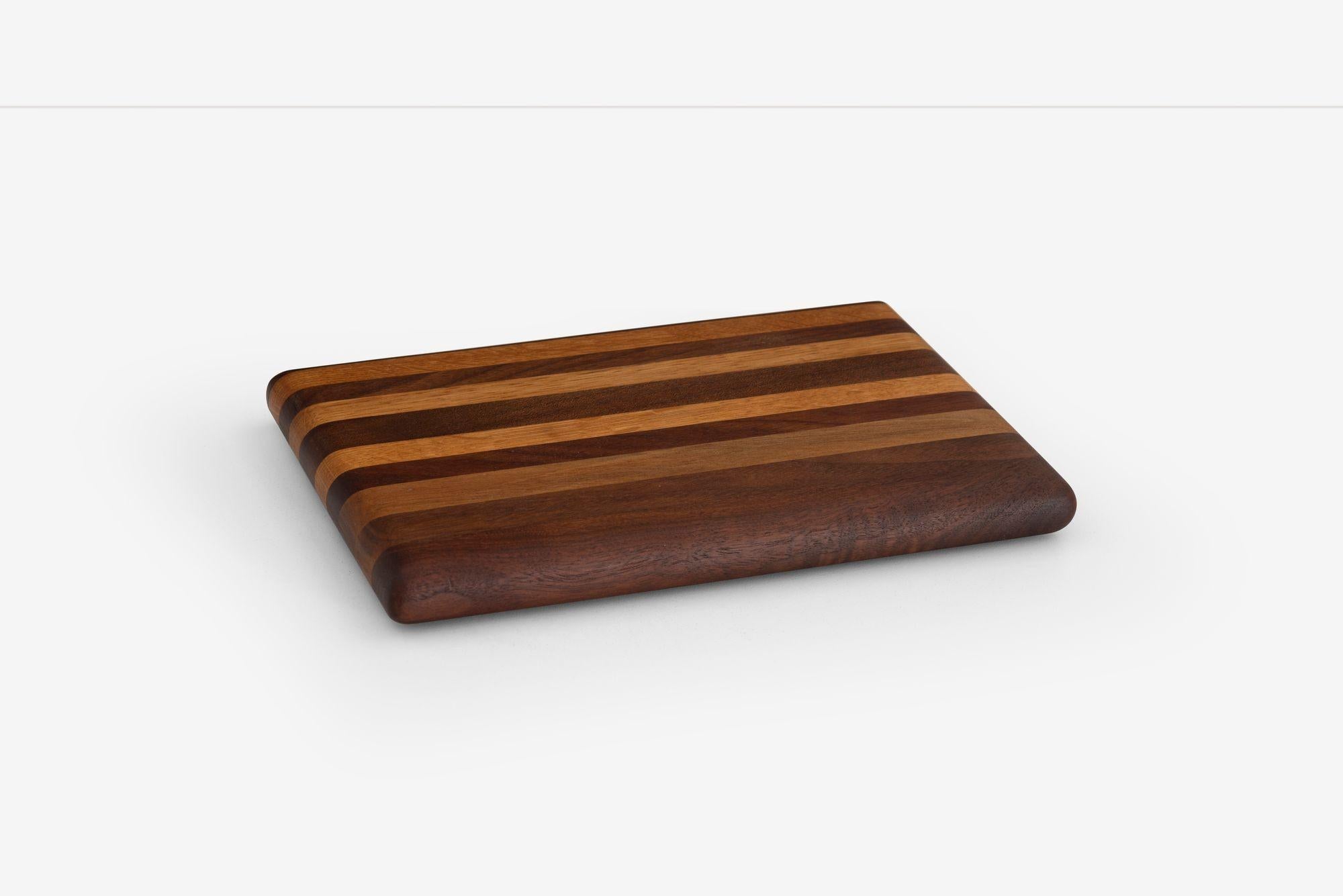Arthur Espenet Carpenter Wood Block or Decorative Tray 1960's
Handmade at the Espenet studio in Bolinas, California, this striking object is crafted from alternating strips of solid walnut and mahogany. Can be used as a small tray or simply