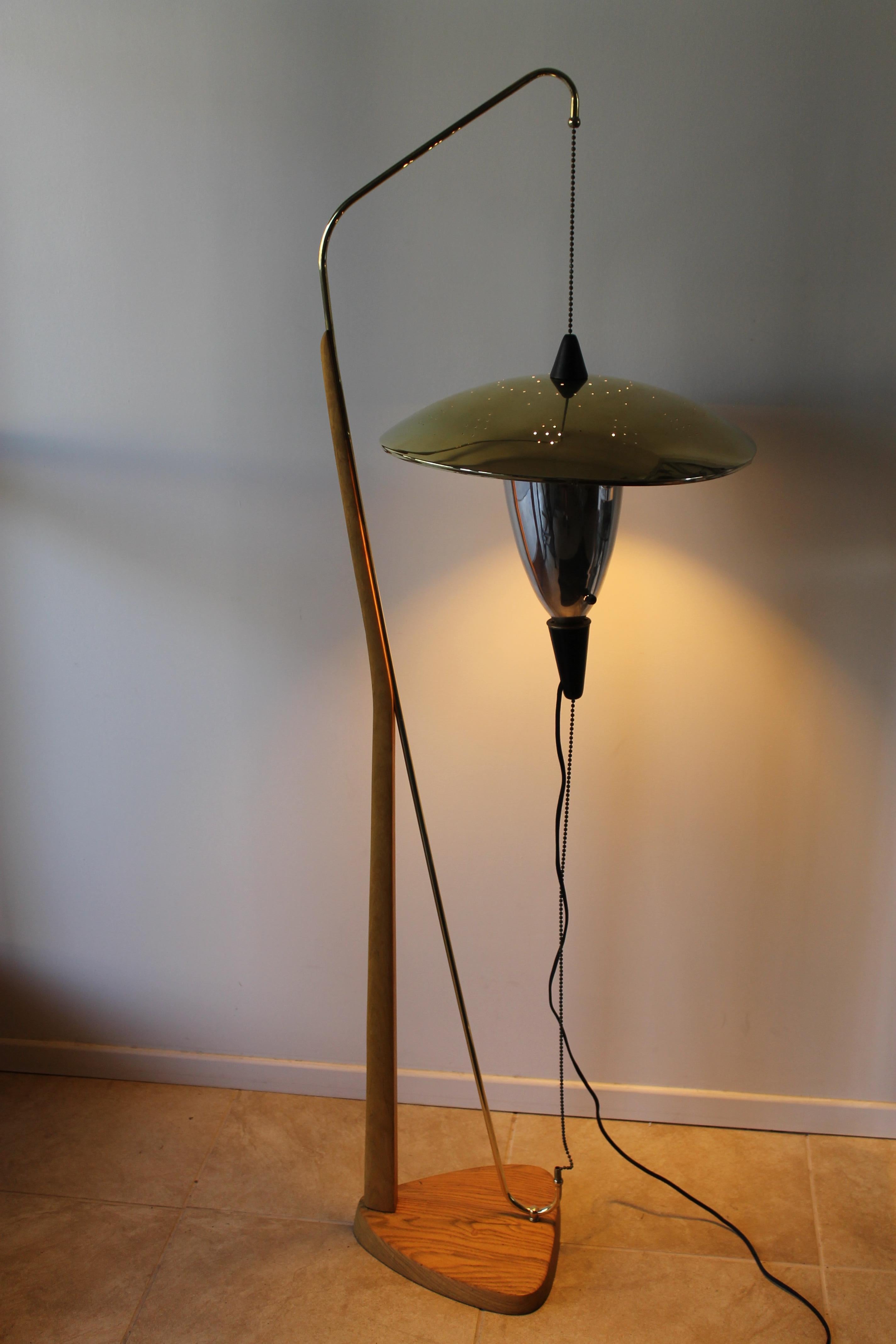 Adjustable floor lamp by Arthur F. Jacobs Height. Patented in 1954. Floor lamp measures 17.5