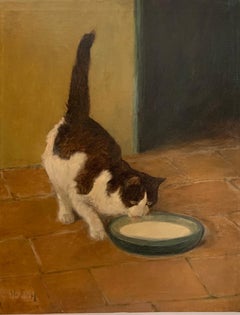 Brown and White Cat Drinking Milk From a Bowl