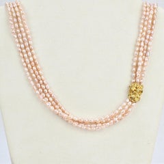 Collana a più fili in oro 18 carati e perle d'acqua dolce di Arthur King