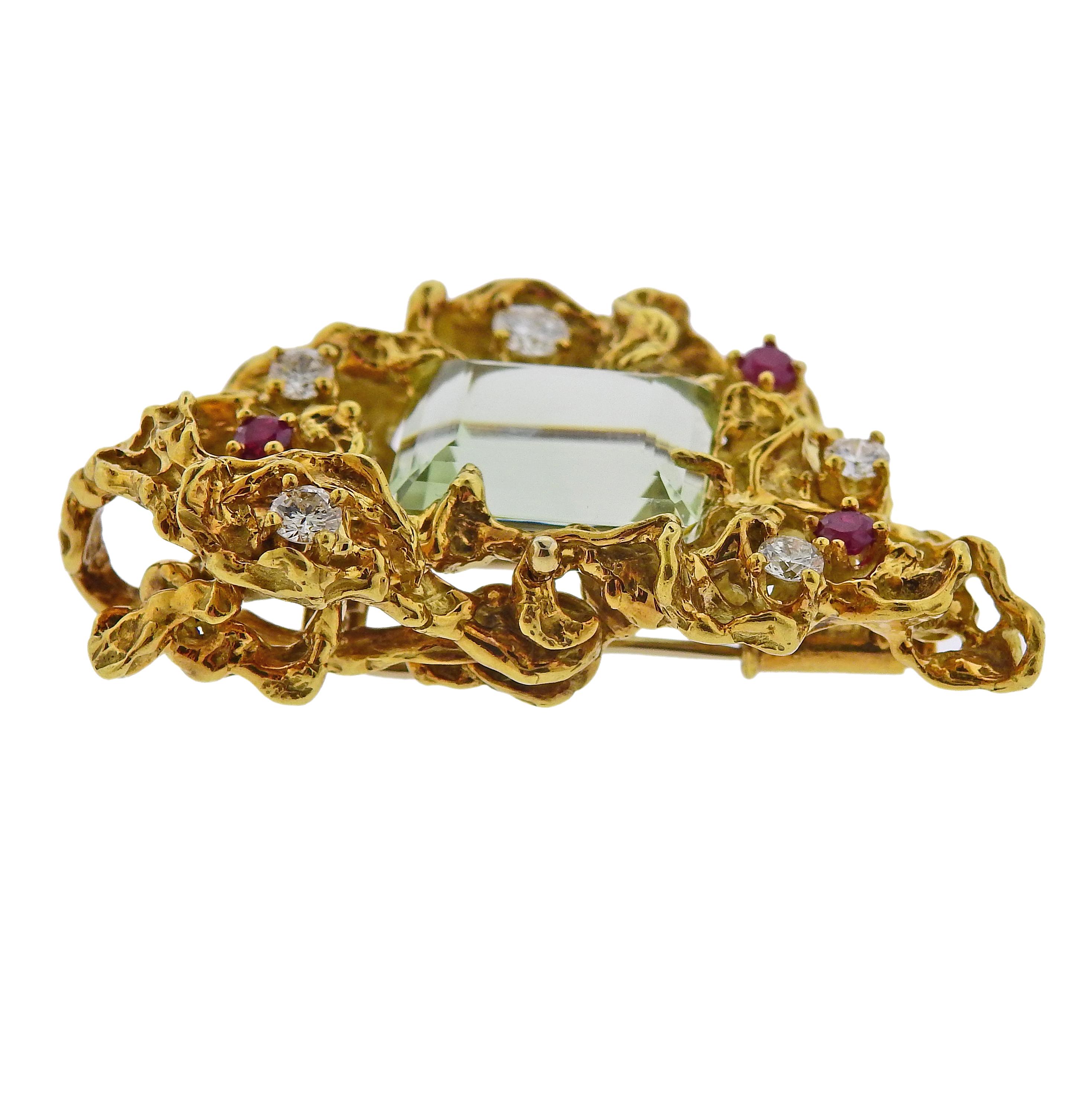 Vintage circa 1970s 18k gold  free form convertible brooch pendant by Arthur King, featuring approx. 0.15ct aquamarine, rubies and approx. 0.85ctw in diamonds. Brooch is 52mm x 33mm, weighs 34.8 grams. Marked: 18k, A. King mark. 