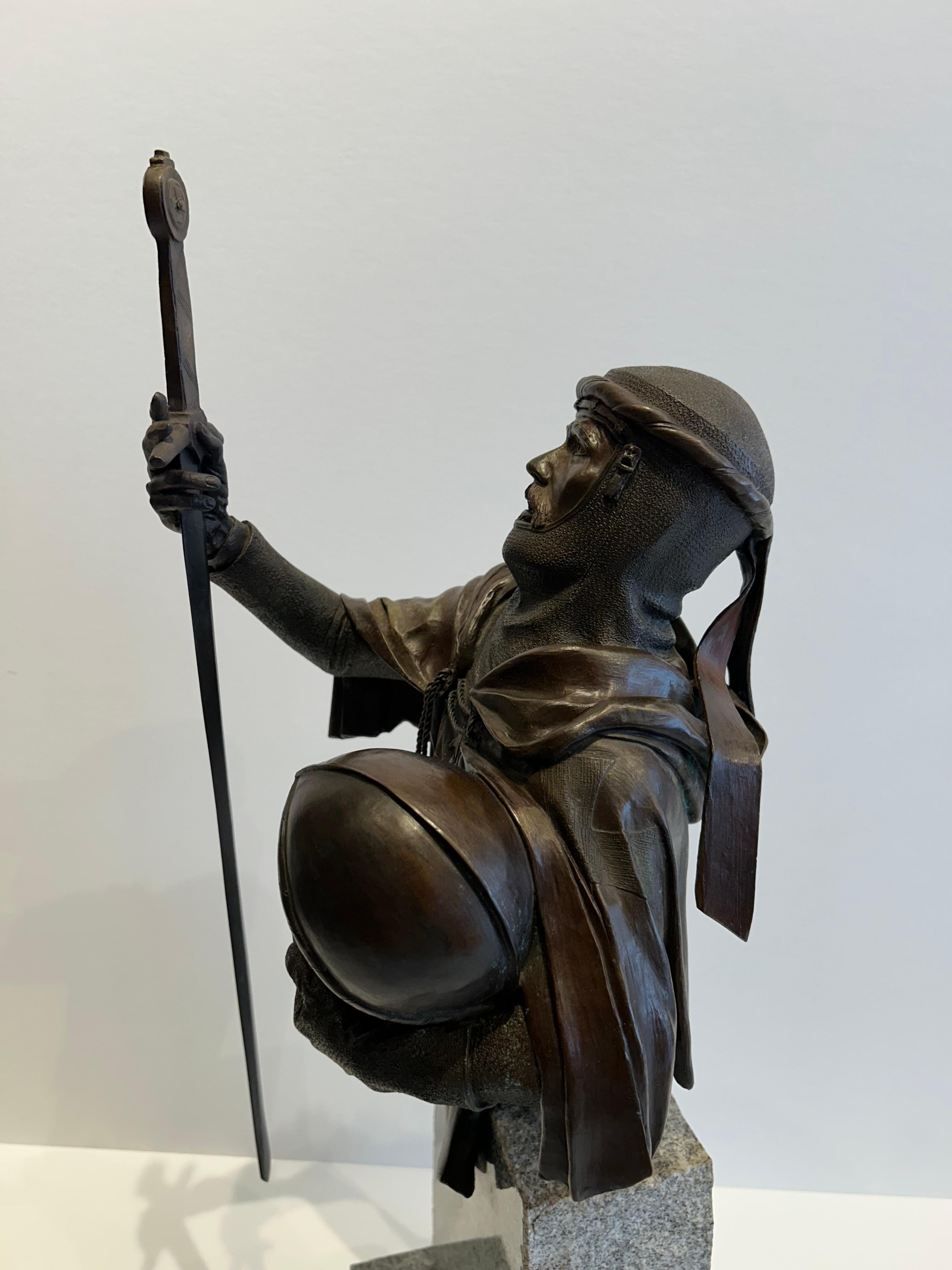 Cast in 1984, The Crusader presents a modern interpretation of the medieval warrior, blending classical sculptural techniques with a contemporary sensibility. The bronze bust captures the resolute expression of a crusader, his features strong and