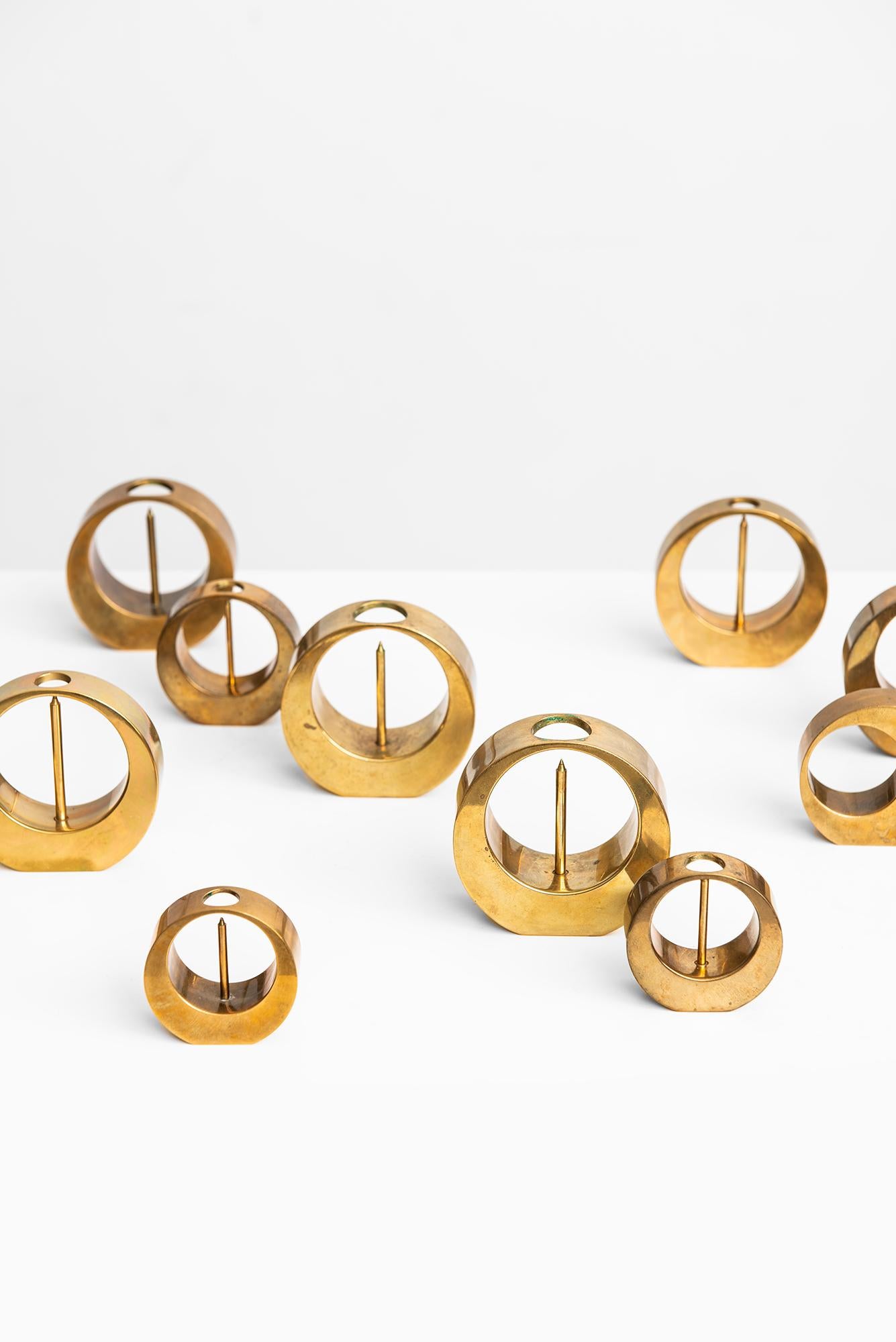 Set of 10 candlesticks designed by Arthur Pe. Produced in his own studio Kolbäck in Sweden.