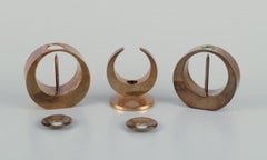 Arthur Pe for Kolbäck, Sweden. Three brass candlesticks. Approx. 1970.