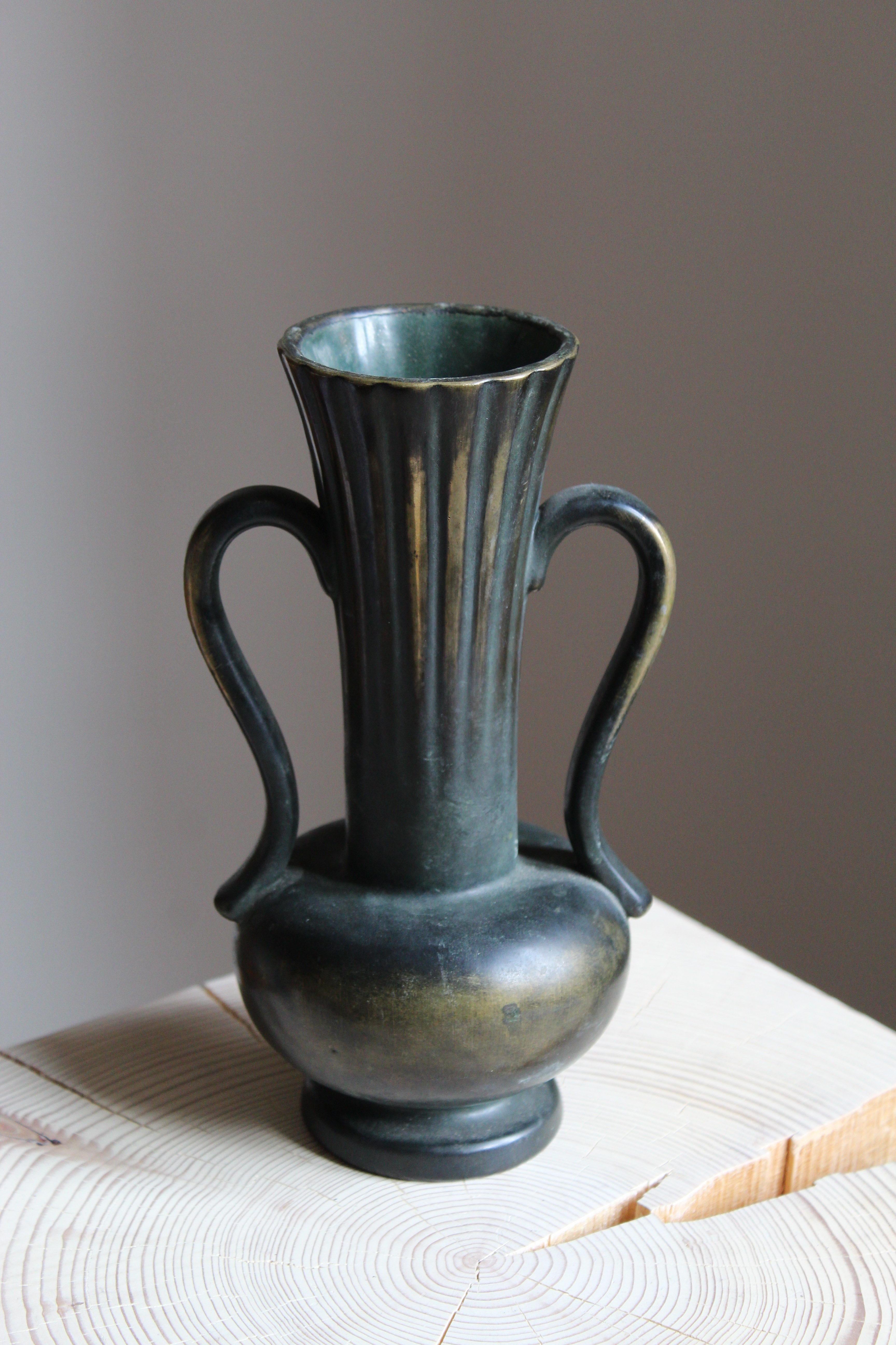 A very rare bronze vase designed by Arthur Percy, produced by Upsala Ekeby, Sweden, 1930s. Usually executed in stoneware, the bronze vases by Percy were produced in very limited numbers.

 