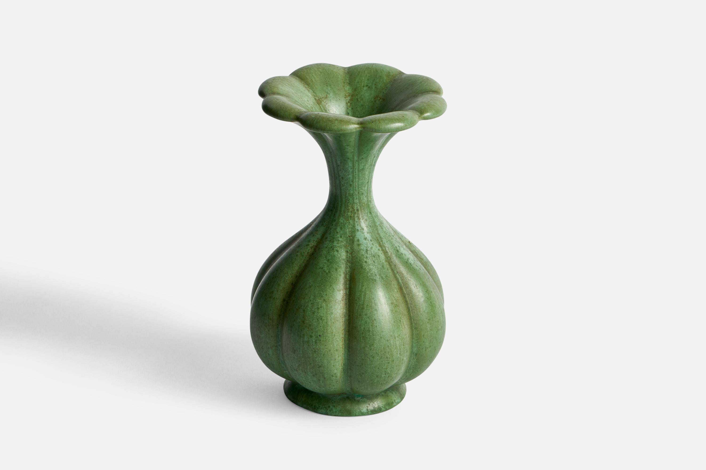A fluted green-glazed ceramic vase designed by Arthur Percy and produced by Gefle, Sweden, 1930s.