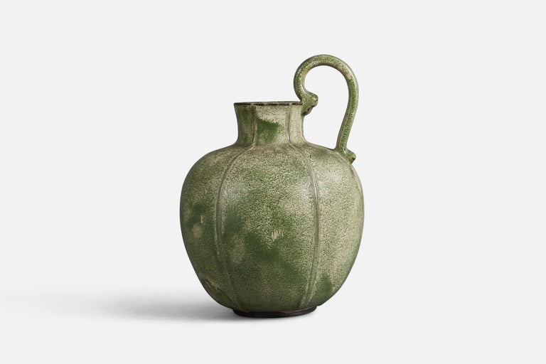 A green-glazed earthenware vase designed by Arthur Percy and produced by Gefle, Sweden, 1930s.