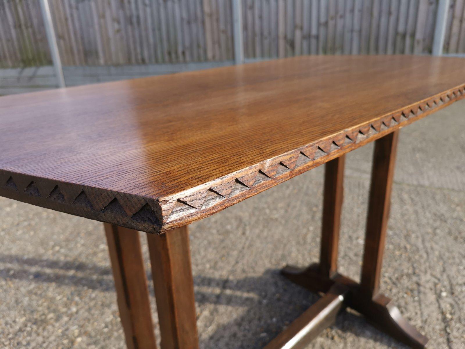 Cotswold style oak refectory dining or library table with carved chevron details For Sale 2