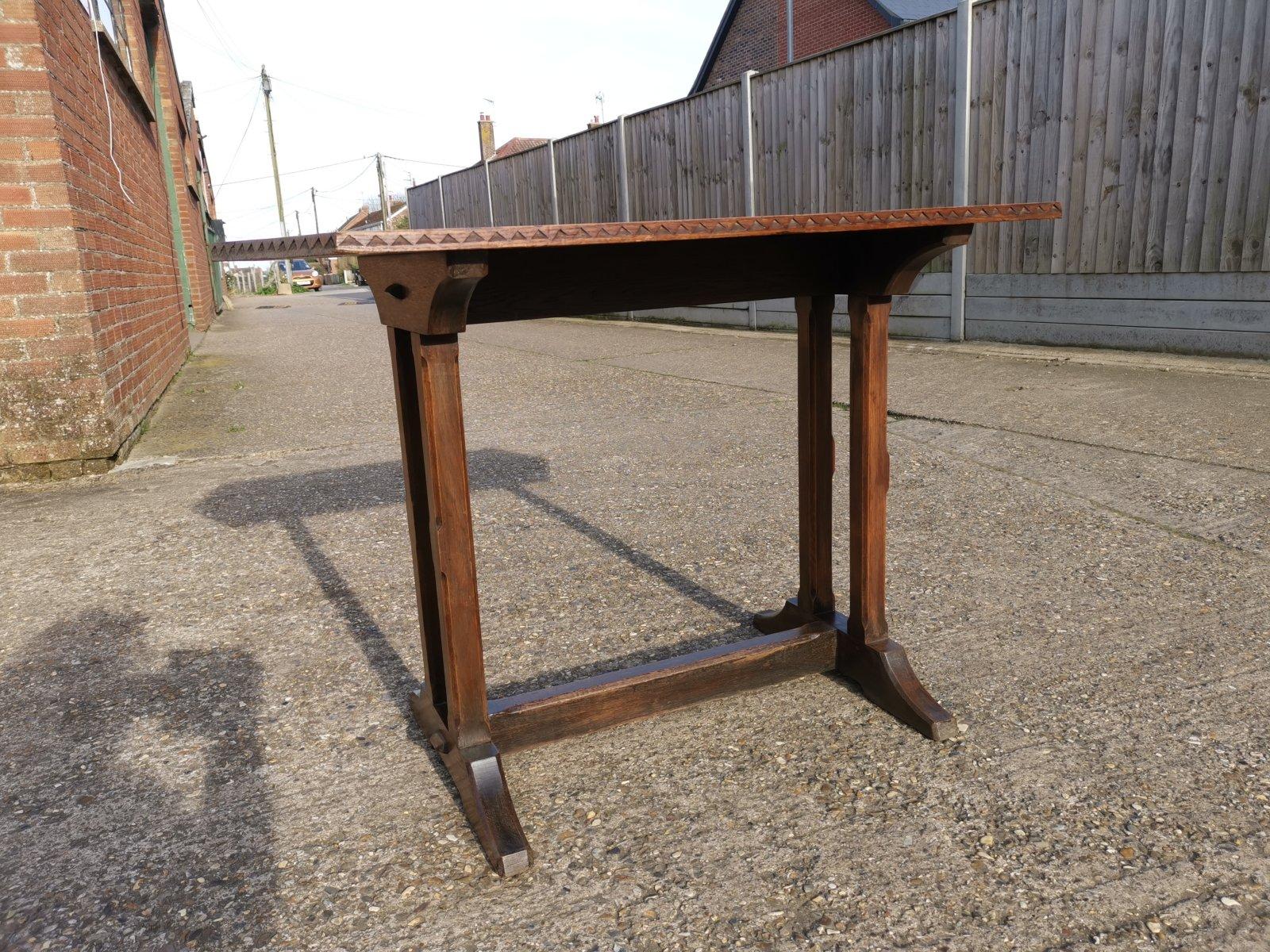 Hand-Crafted Cotswold style oak refectory dining or library table with carved chevron details For Sale