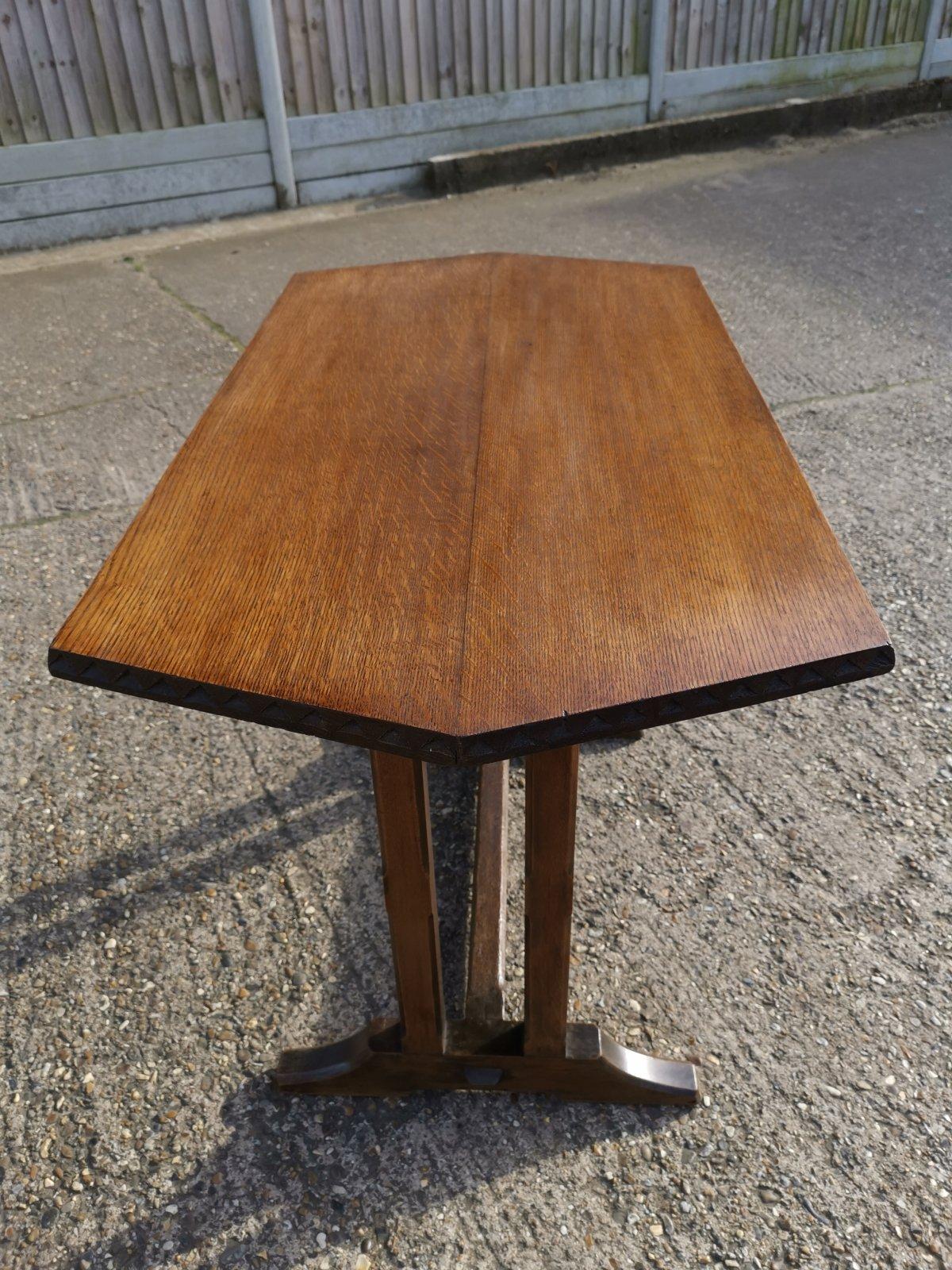Cotswold style oak refectory dining or library table with carved chevron details For Sale