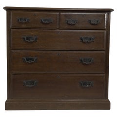 Antique Arthur Simpson of Kendal. Arts & Crafts oak chests of drawers with iron handles.