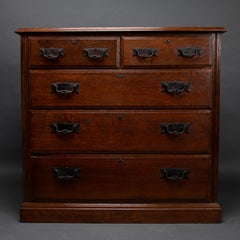 Arthur Simpson of Kendal. Arts & Crafts oak chests of drawers with iron handles.
