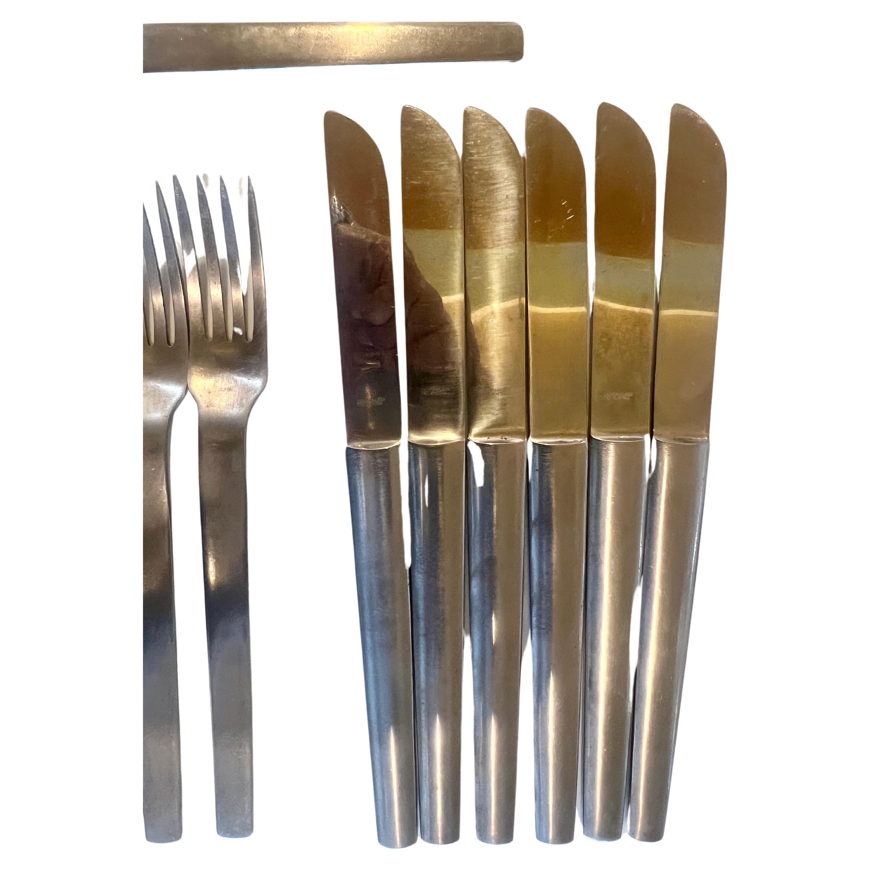 Beautiful design on these set of flatware designed by Arthur Salm 6 dinner forks , 4 salad forks , 5 spoons , 1 teaspoon and 6 knives , with satin finish handles made in Austria , by arthur Salm.