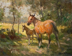 A mare and foal shading under the trees
