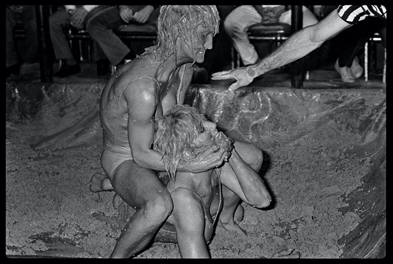 Catfight V
by Arthur Steel

Catfight – Female Bikini Mud Wrestlers, Hollywood Tropicana, Los Angeles 1985 – Set of 6 prints.

Arthur recalls:
“I was in Los Angeles with the British cricketer Ian Botham, as he was hoping to forge a career as a