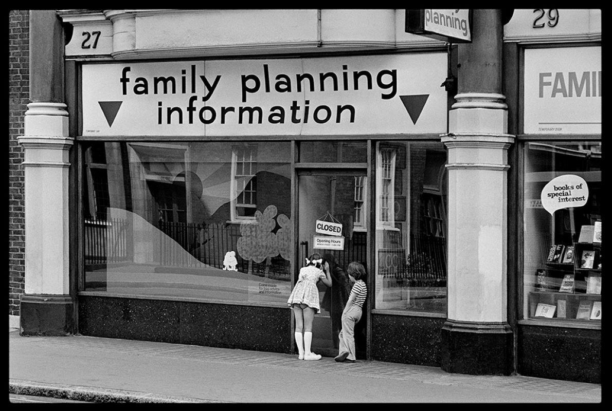 Family Planning 

By Arthur Steel 

Paper size: 34 x 26" / 86 x 66 cm

Silver Gelatin Print
1975 (printed later)
unframed
hand signed
limited edition of 50

note other print sizes and framing options are available, please enquire for