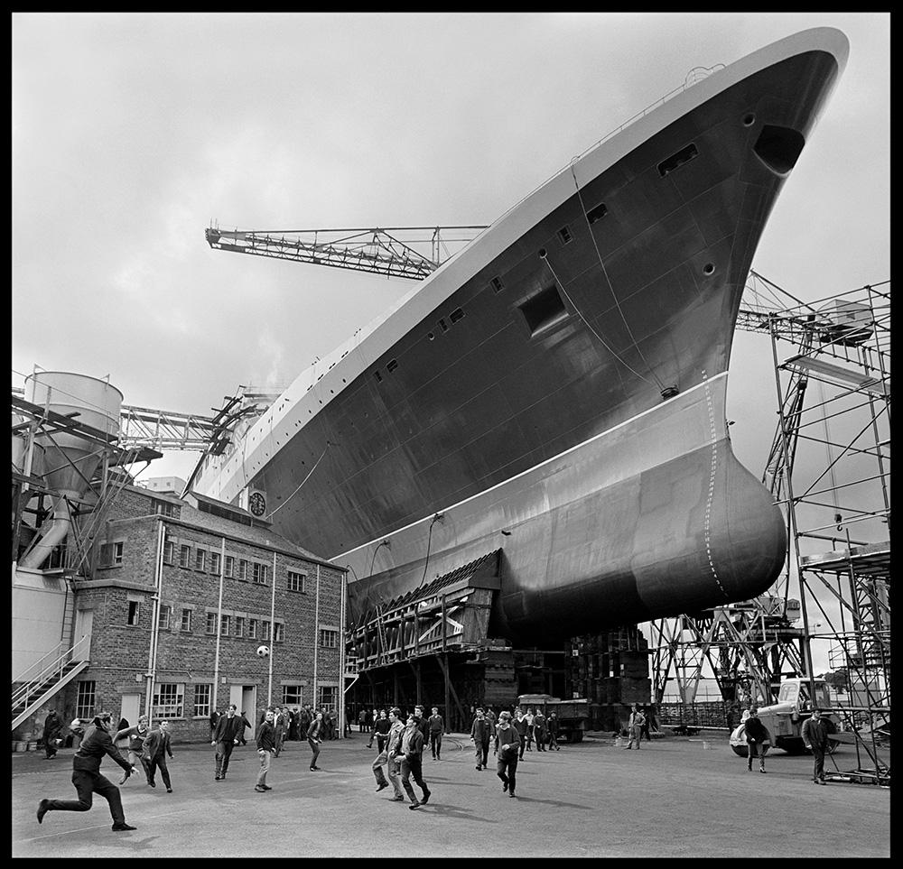 Shipyard Football Game QE2 Queen Elizabeth

By Arthur Steel 

Paper size: 54 x 41" / 137 x 104 cm

Silver Gelatin Print
1960 (printed later)
unframed
hand signed
limited edition of 20

note other print sizes and framing options are available, please