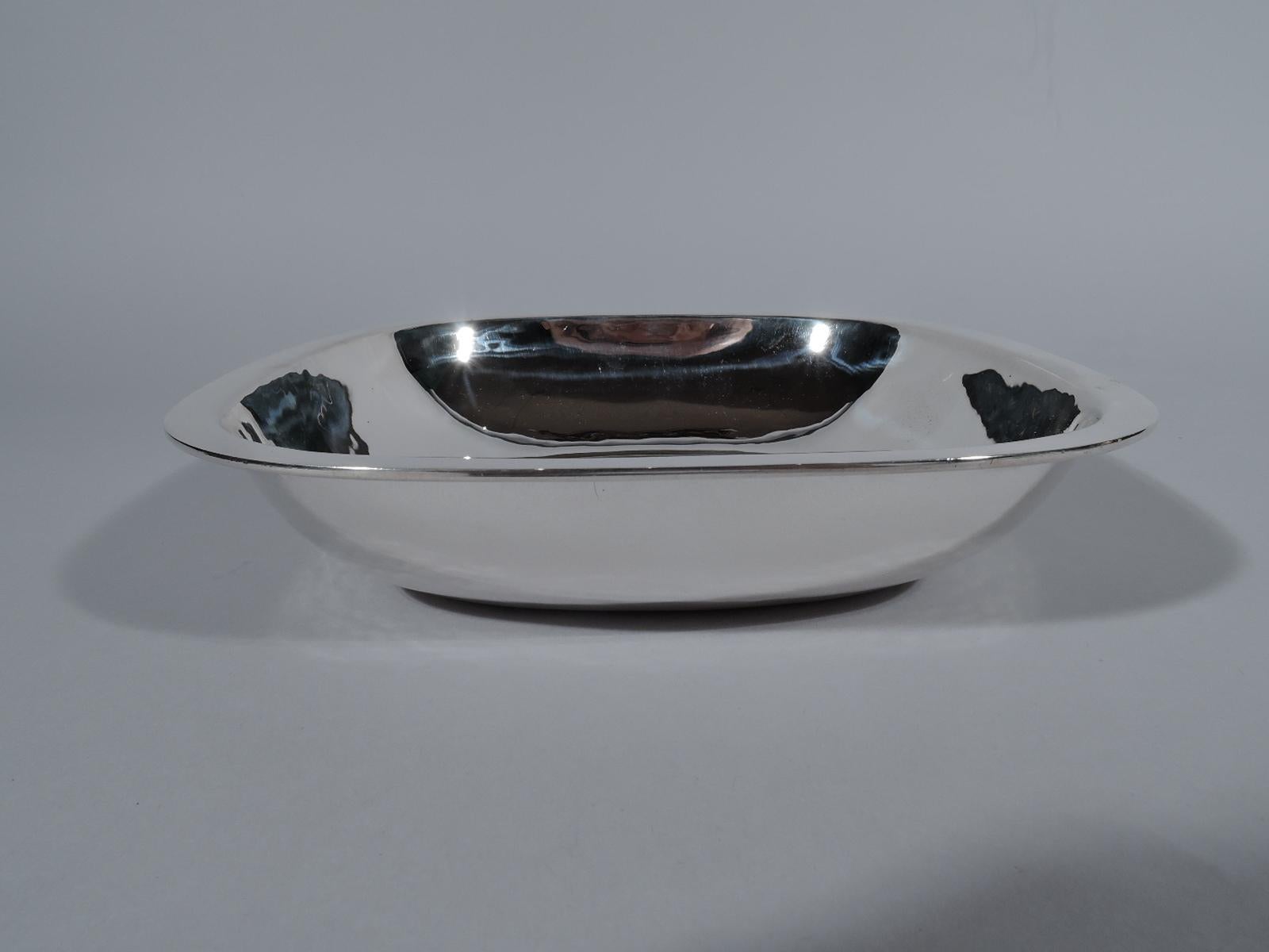 Modern sterling silver bowl. Handmade by Arthur Stone in Gardner, Mass. Squarish with 4 fluidly curved and tapering sides, and flat rim. Fully marked including maker’s stamp and craftsman’s initial C for either David Carlson (fl. 1909-1919) or