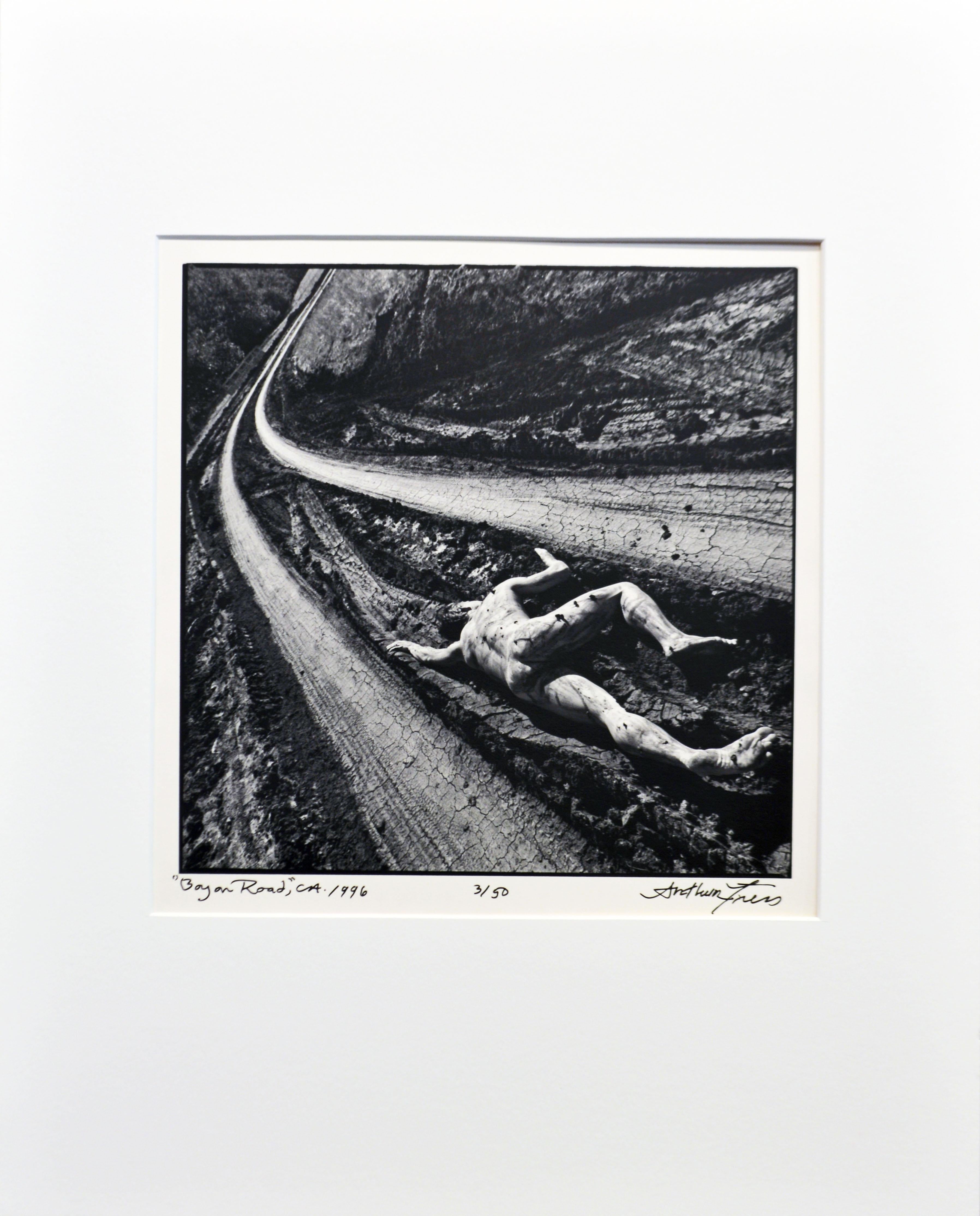 Arthur Tress (American b. 1940)
'Hockey Boy on Road 1996' Signed, numbered and titled recto in margin under image. Gelatin silver print. Image: 10 x 10 in / 25.5 x 25.5 cm. Full margins. Mat: 16 x 20 in / 41 x 51 cm. This work is included full page