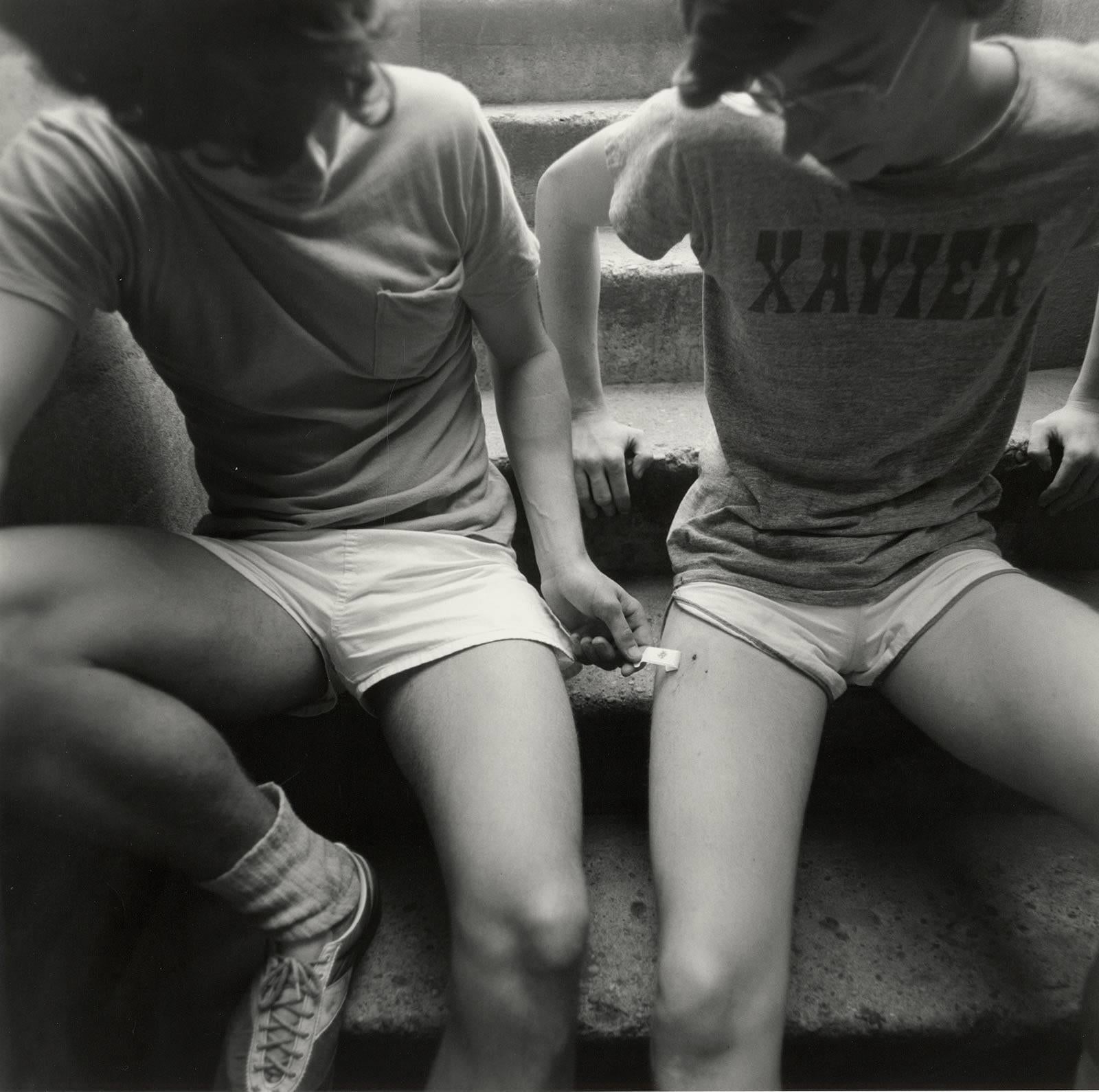 Arthur Tress Portrait Photograph - Teenage Runners (two innocent young boys in intimate moment on a New York stoop)