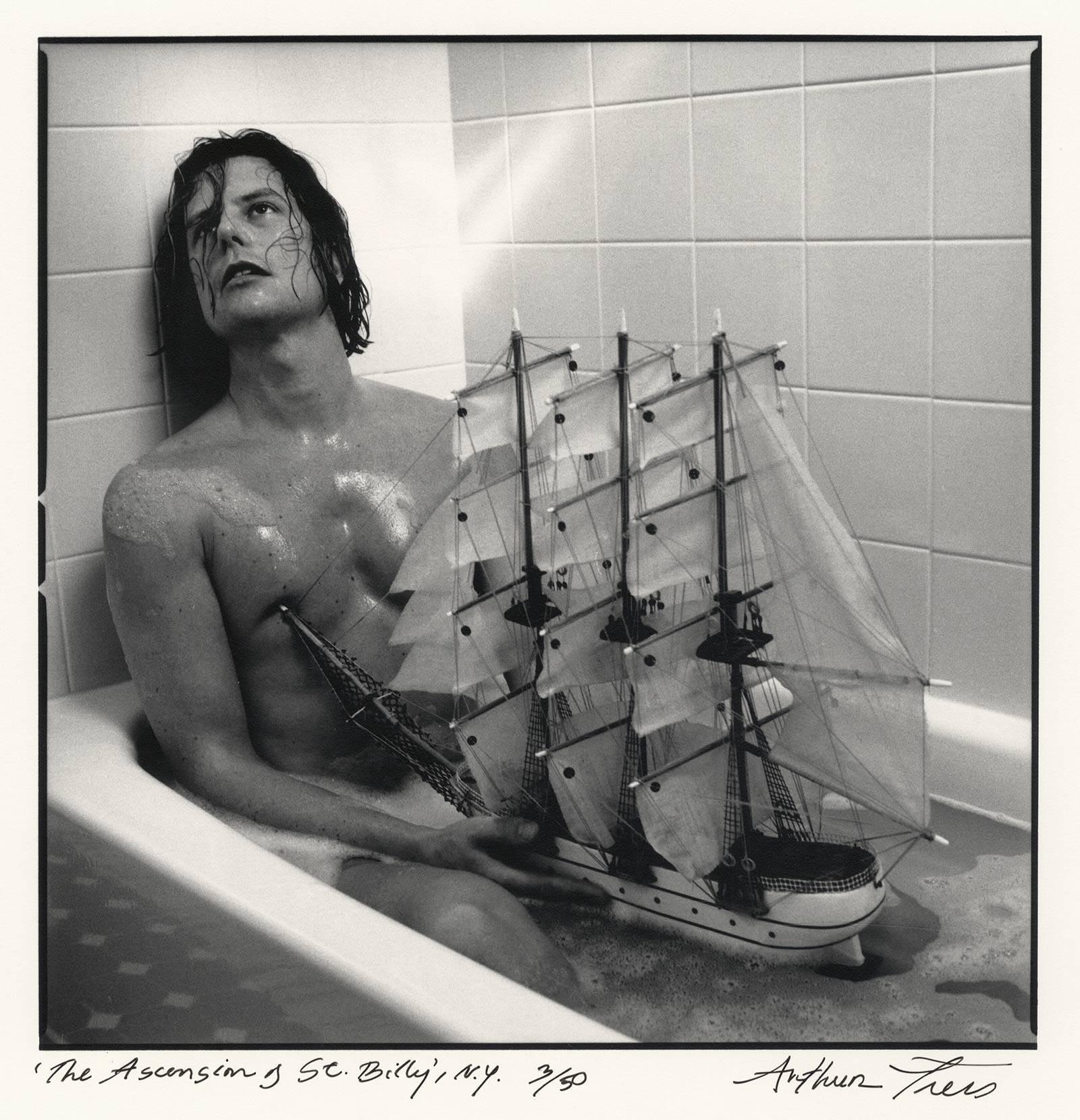 Arthur Tress Figurative Photograph - The Ascension of St. Billy's, NY (male nude soaks in tub as his boat comes)