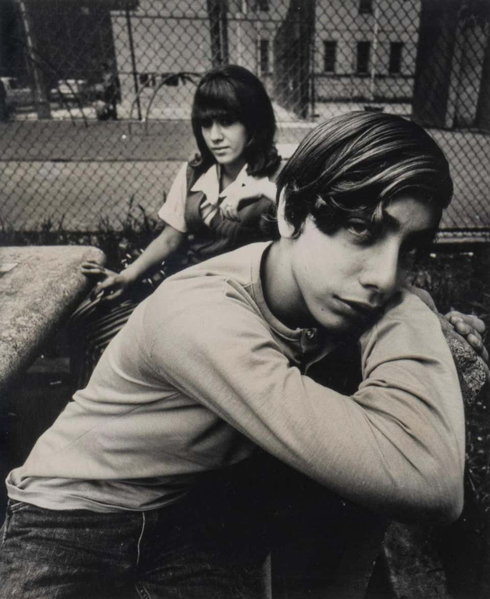 Two Teenagers in a Housing Project Park