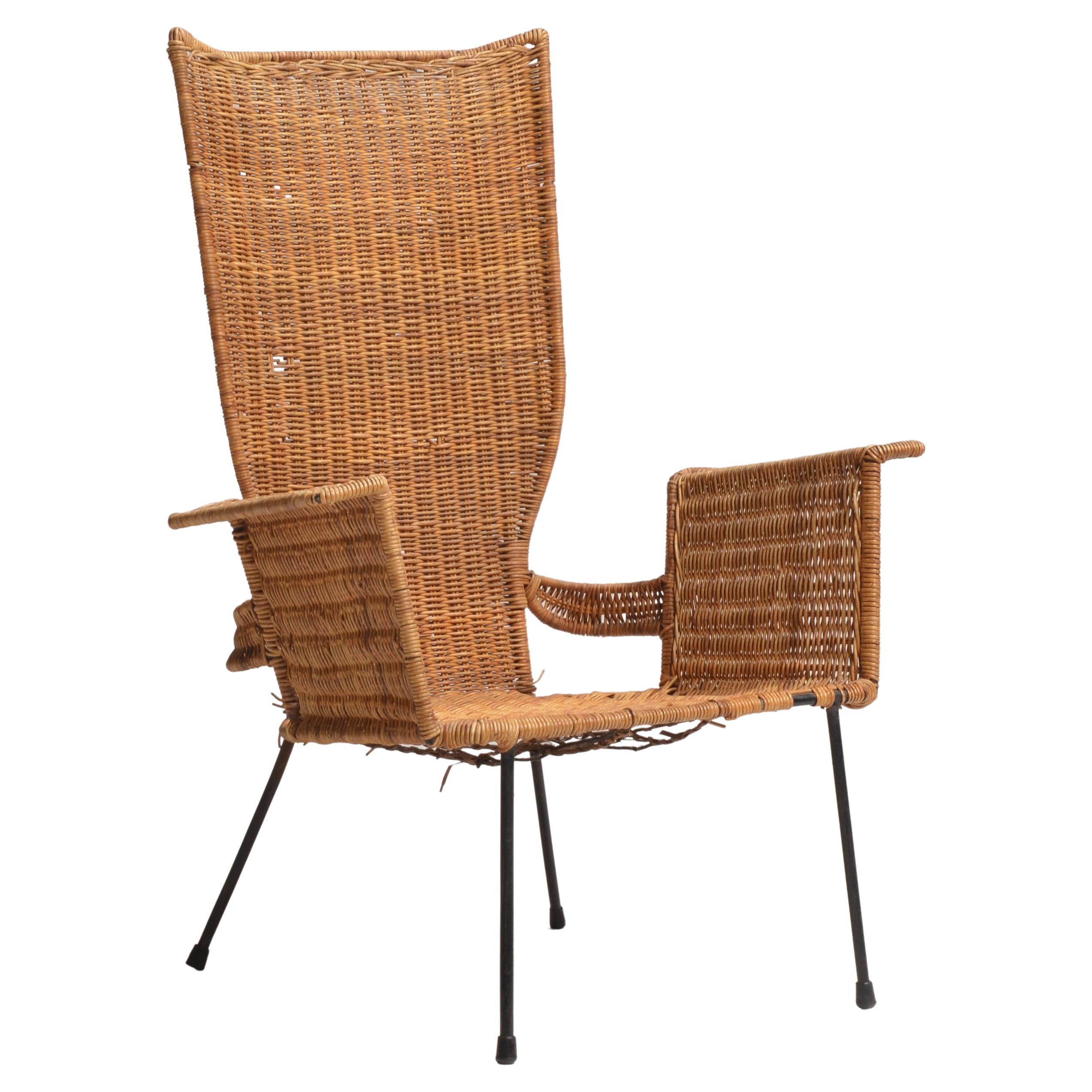Sehr seltener Sessel aus Stahl in Rattan von Arthur Umanoff. 

Arthur Umanoff (1923-1985) ist ein amerikanischer Industriedesigner, der sowohl Möbel und Leuchten als auch Einrichtungsgegenstände entworfen hat. Umanoff absolvierte in den 1950er