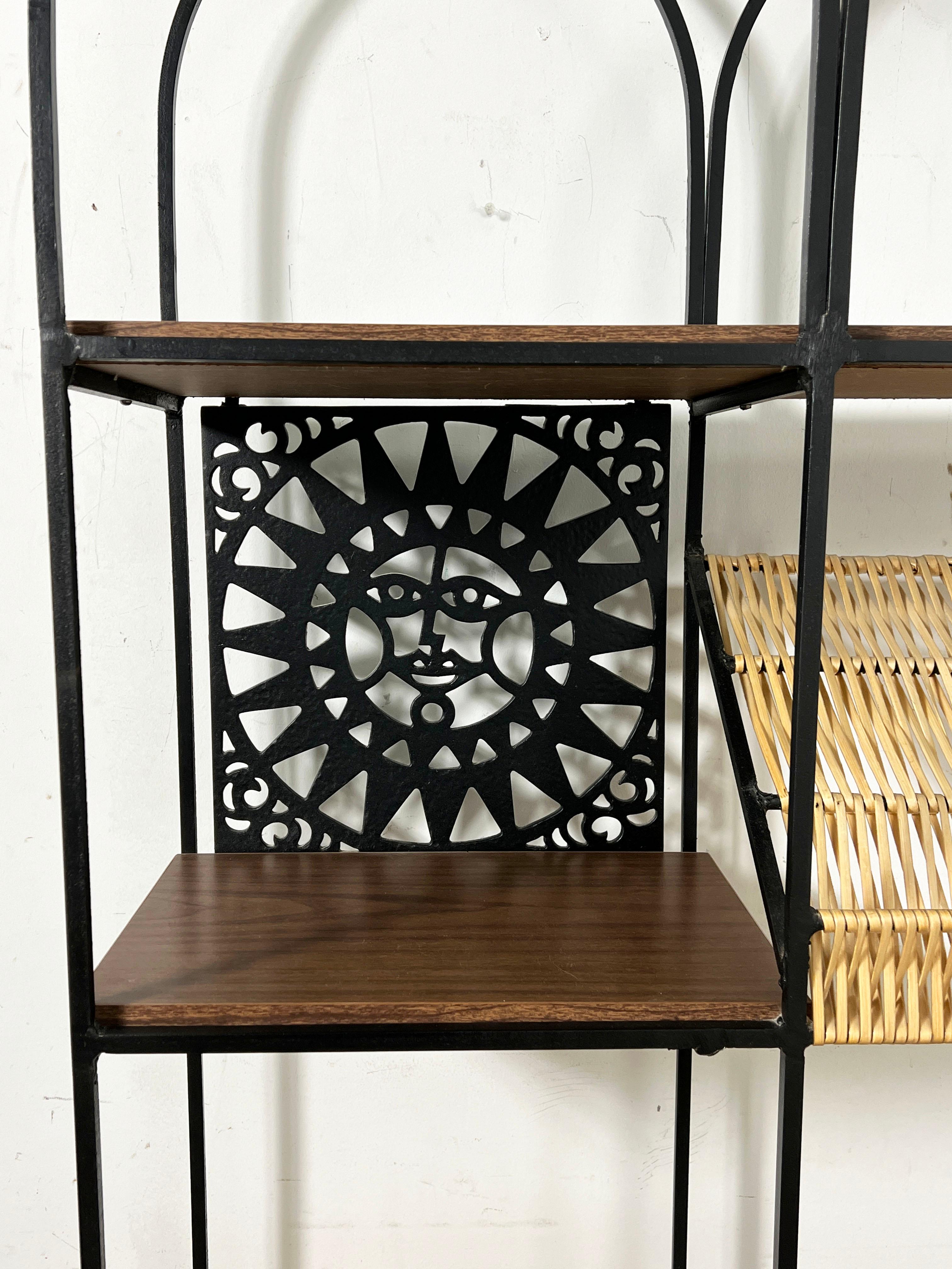 Arched top etagere shelving display unit with woven elements designed by Arthur Umanoff as part of his Mayan collection for Shaver Howard, ca. 1960s.  