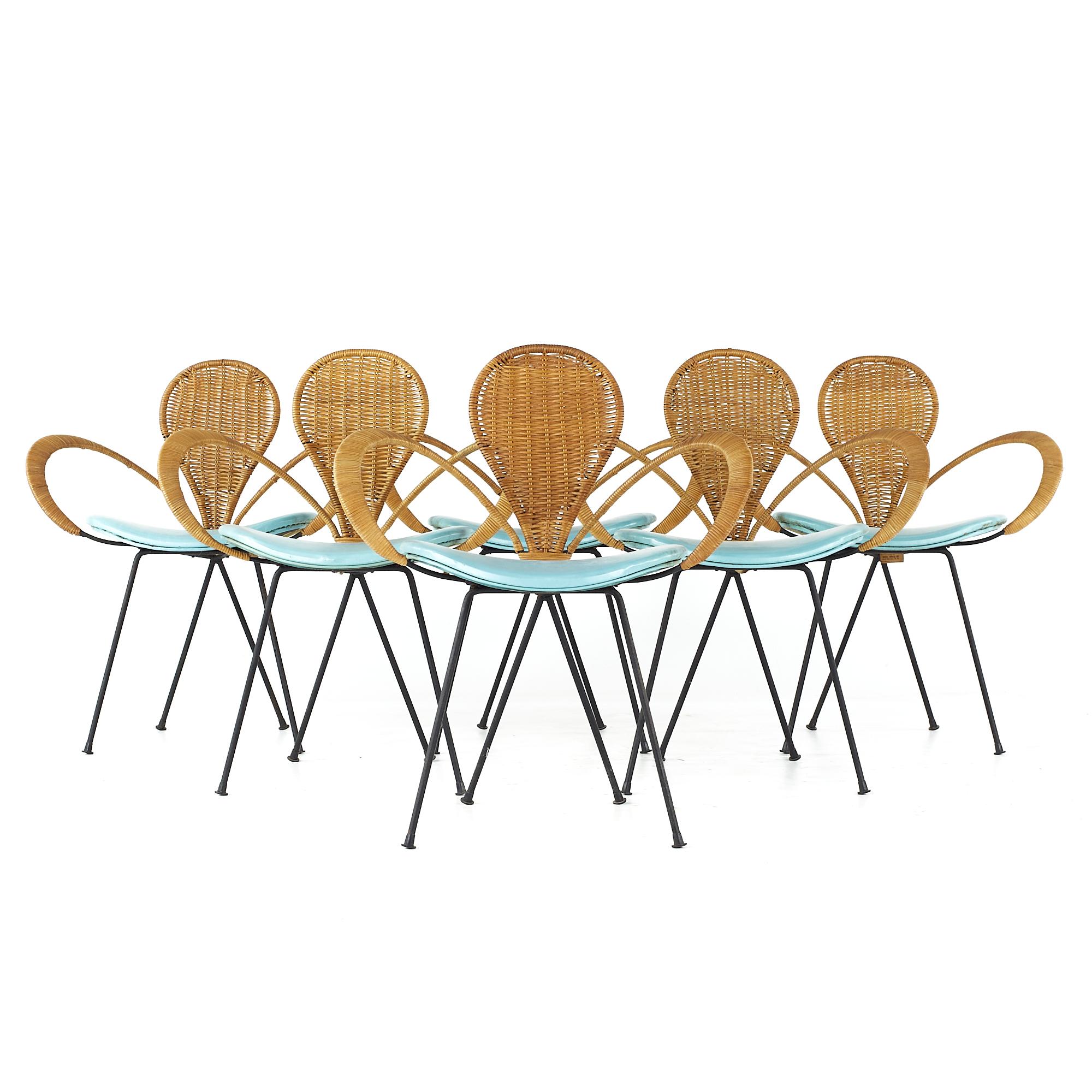 Arthur Umanoff for Shaver Howard MCM Rattan and iron dining chairs - set of 6

Each chair measures: 26.75 wide x 19 deep x 32 inches high, with a seat height of 17.5 and arm height/chair clearance of 26.5 inches

All pieces of furniture can be