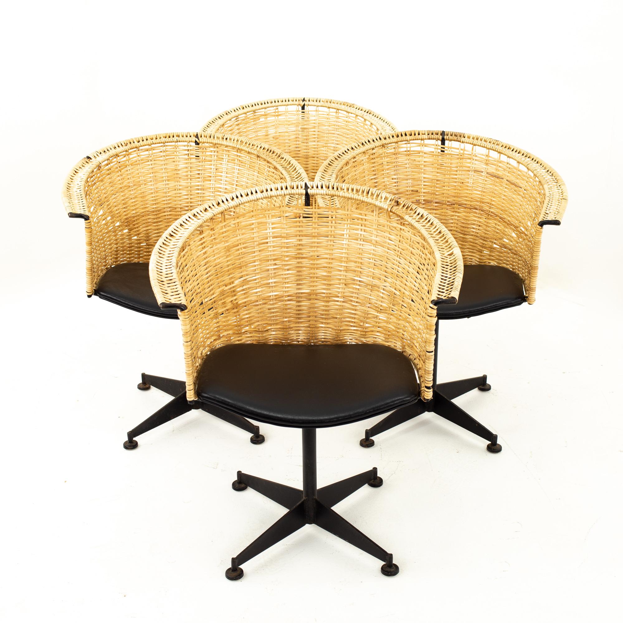 Arthur Umanoff for Shaver Howard midcentury iron and vinyl wicker chairs - Set of 4
Each chair measures: 26.5 wide x 21.5 deep x 31 high, with a seat height of 17.5 inches

All pieces of furniture can be had in what we call restored vintage
