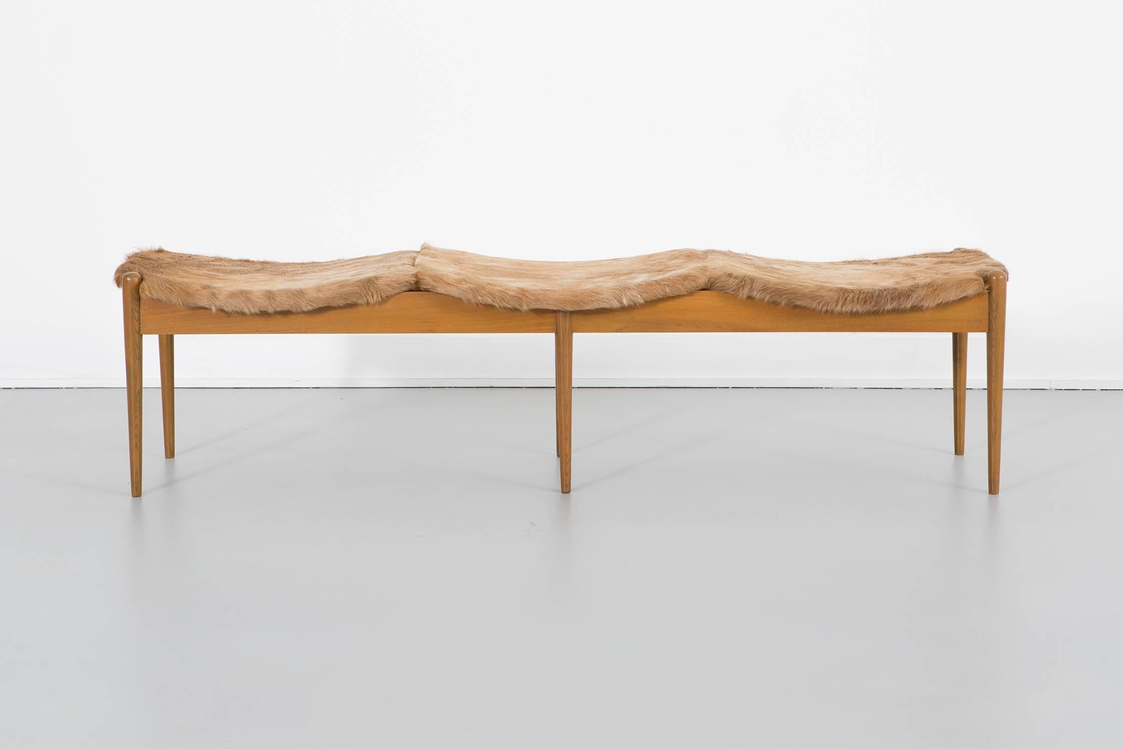 3000 Series bench

Designed by Arthur Umanoff for Washington Woodcraft

USA, circa 1960s

Walnut and Brazilian cowhide

Measures: 15 7/16” H x 60 7/16” W x 16 ½” D x seat 14 ?” H.