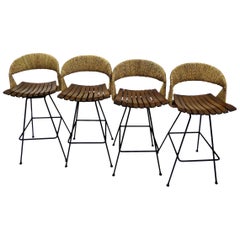 Vintage Arthur Umanoff Mid-Century Modern Raffia Backed Swivel Barstools for Raymor