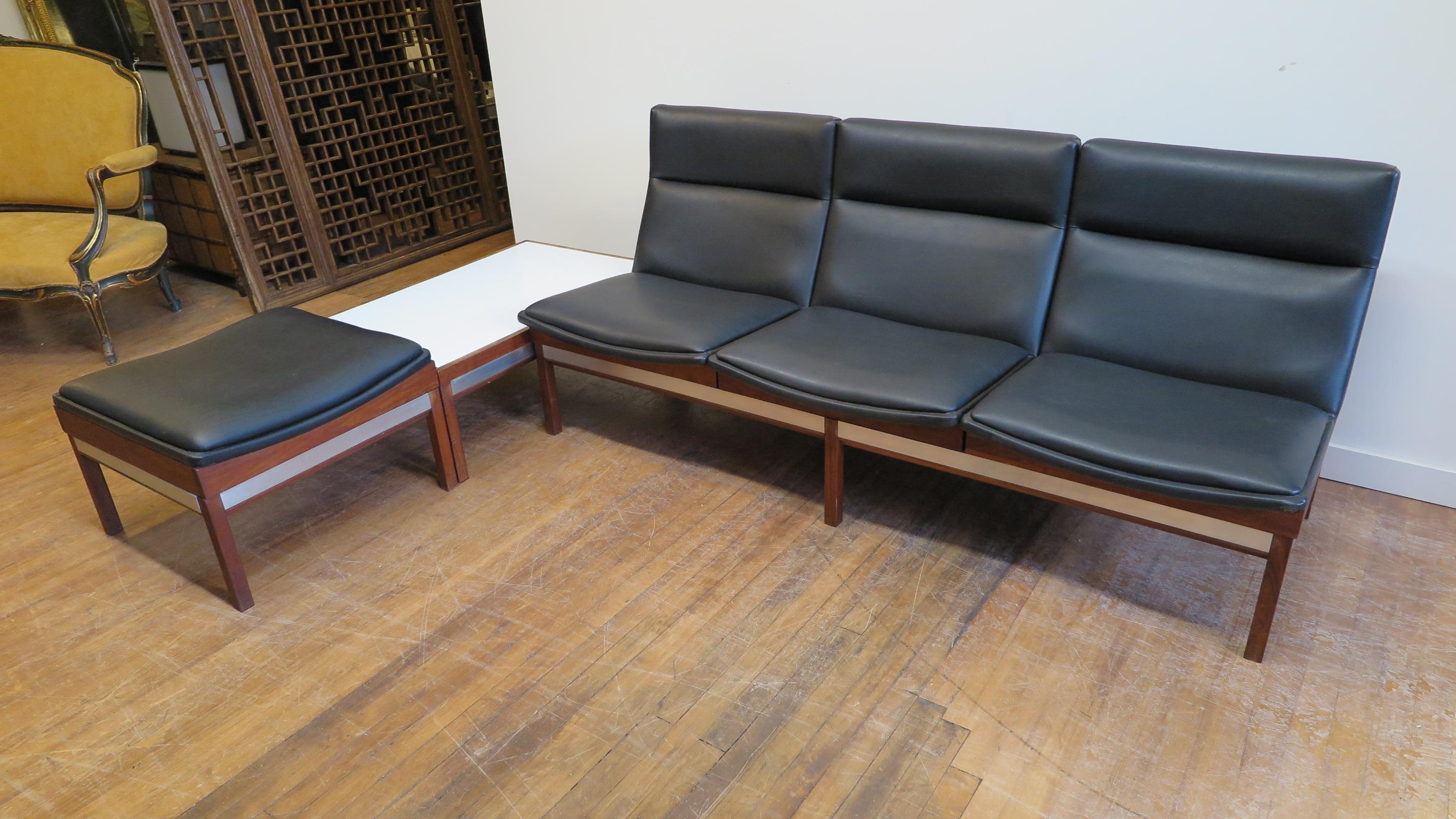 Arthur Umanoff modular sofa, ottoman and table sectional set for Madison furniture. Walnut with Aluminium trim, vinyl leatherette, and white melamine topped table. This set was purchased directly from Arthur and his wife Charlotte by their neighbour