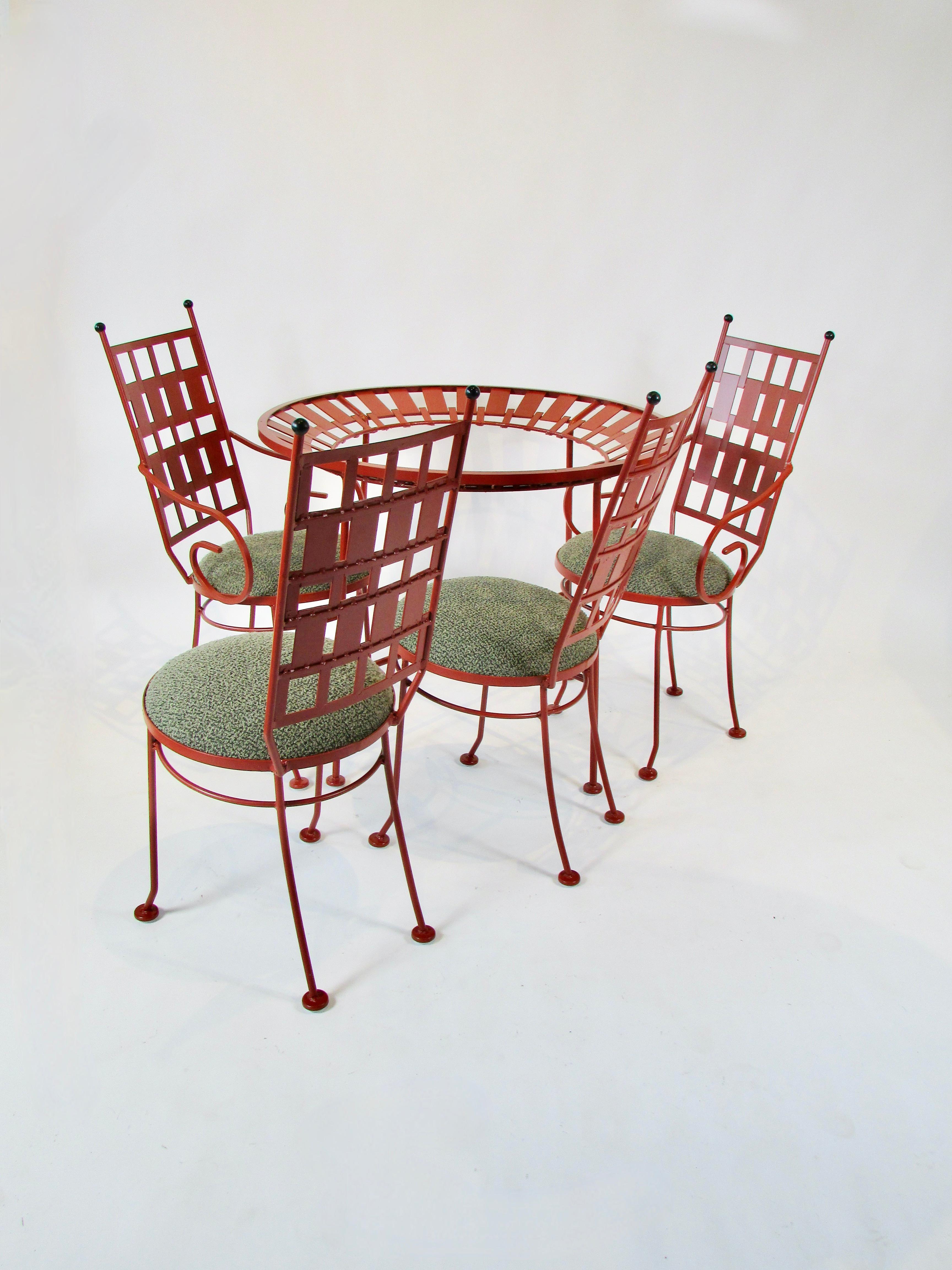20th Century Arthur Umanoff round wrought iron table with four chairs in terra cotta finish For Sale