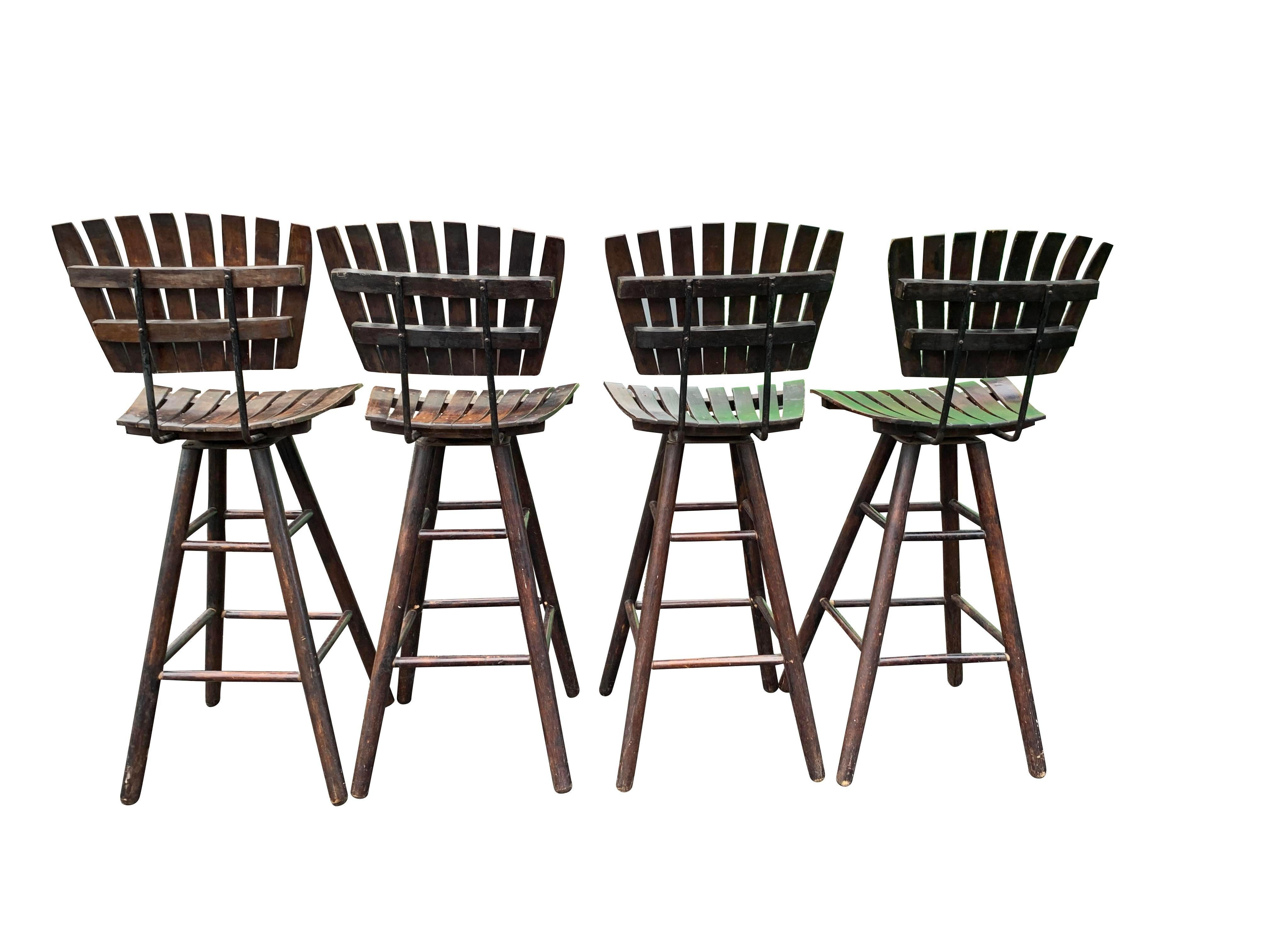 Arthur Umanoff Style Mid-Century Modern Bar or Counter Stools - Set of 4.

Add a touch of mid-century modern style to your home bar or kitchen counter with this stunning set of four Arthur Umanoff Style Mid-Century Modern Bar or Counter Stools.