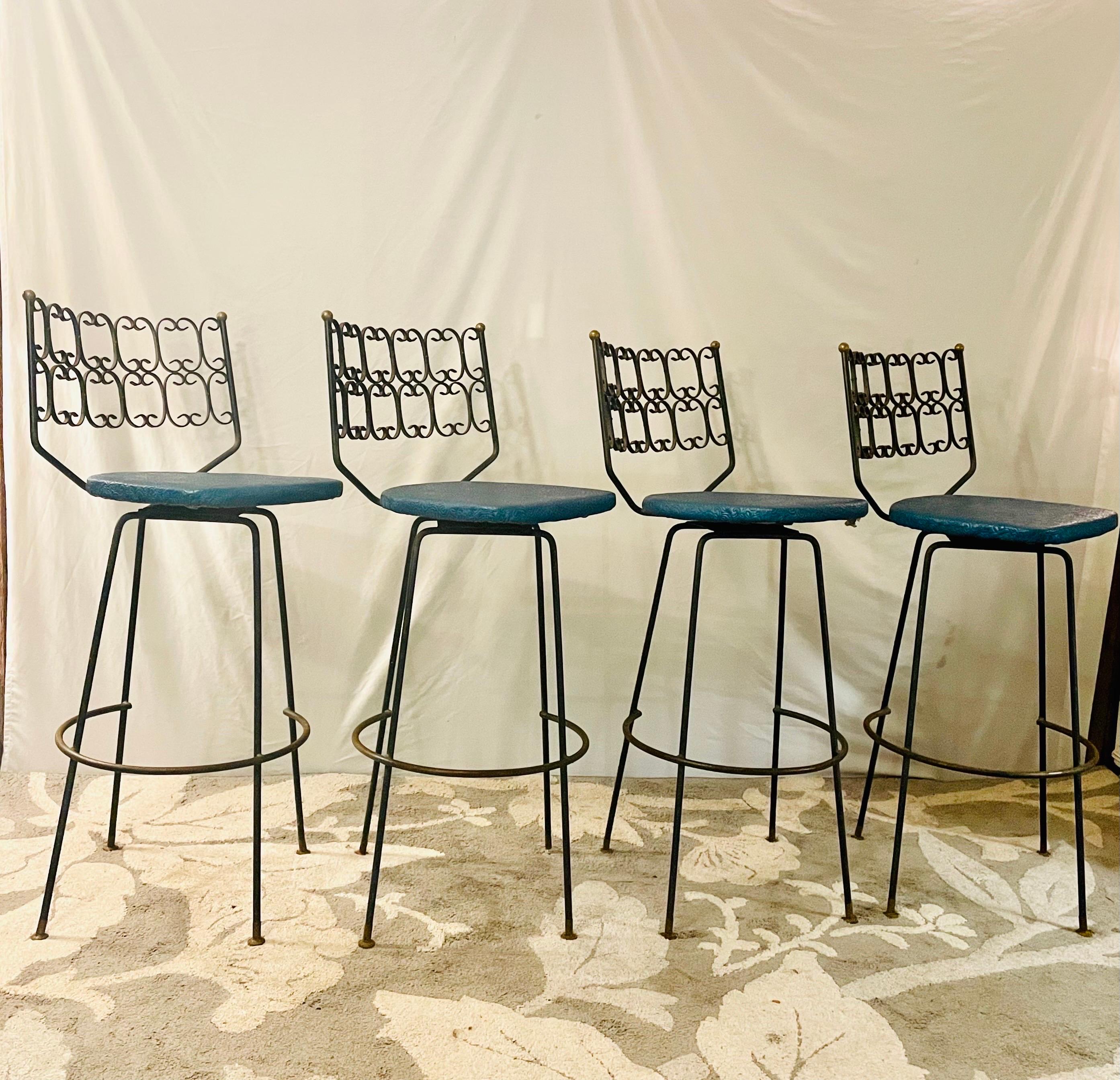 Arthur Umanoff Swivel bar stools-A set of 4

In stock and ready to ship

Bar height stools with Vinyl Seating 

Perfect for indoor use or outdoors on your deck, garden, or patio

Heavy wrought iron with gold accent detail.

 
