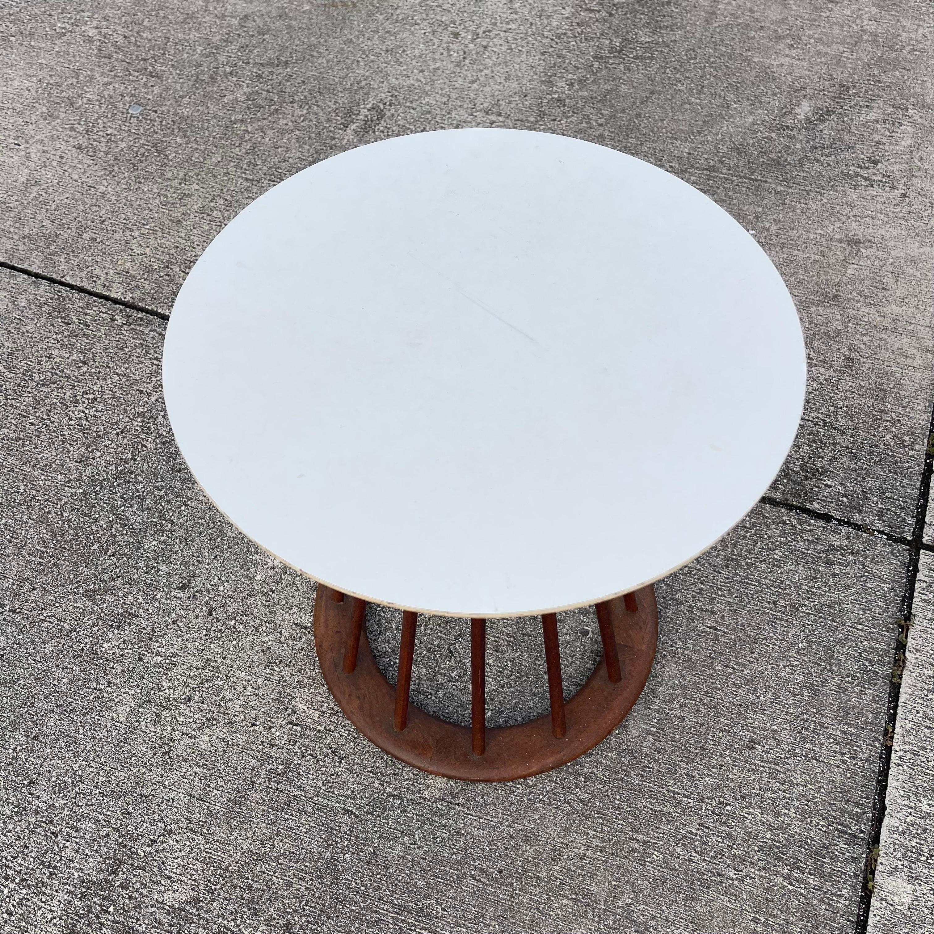 Mid-Century Arthur Umanoff (attr.) walnut spindle side table with white laminate top.